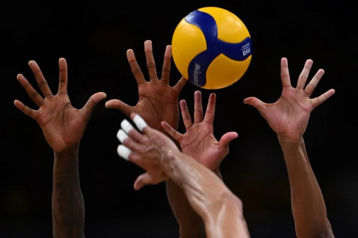 Argentina's Bruno Lima spikes the ball during the FIVB Volleyball Men's Nations League match between Brazil and Argentina at the Maracanazinho gymnasium in Rio de Janeiro, Brazil, on May 23, 2024.  MAURO PIMENTEL / AFP