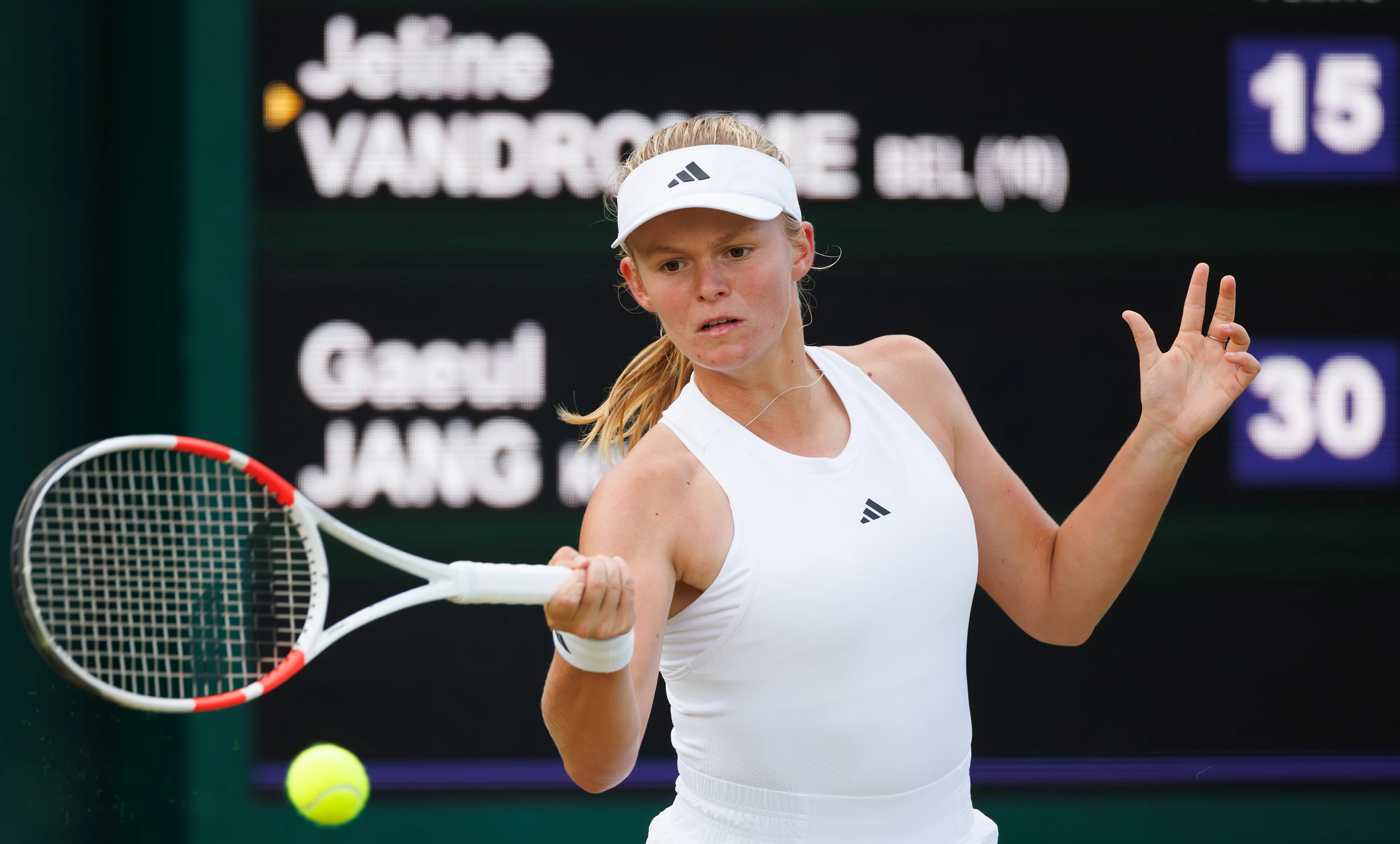 Belgian Jeline Vandromme pictured in action during a tennis match between Belgian Vandromme and Korean Jang, in round 1 of the girls singles of the 2024 Wimbledon grand slam tournament at the All England Tennis Club, in south-west London, Britain, Sunday 07 July 2024. BELGA PHOTO BENOIT DOPPAGNE