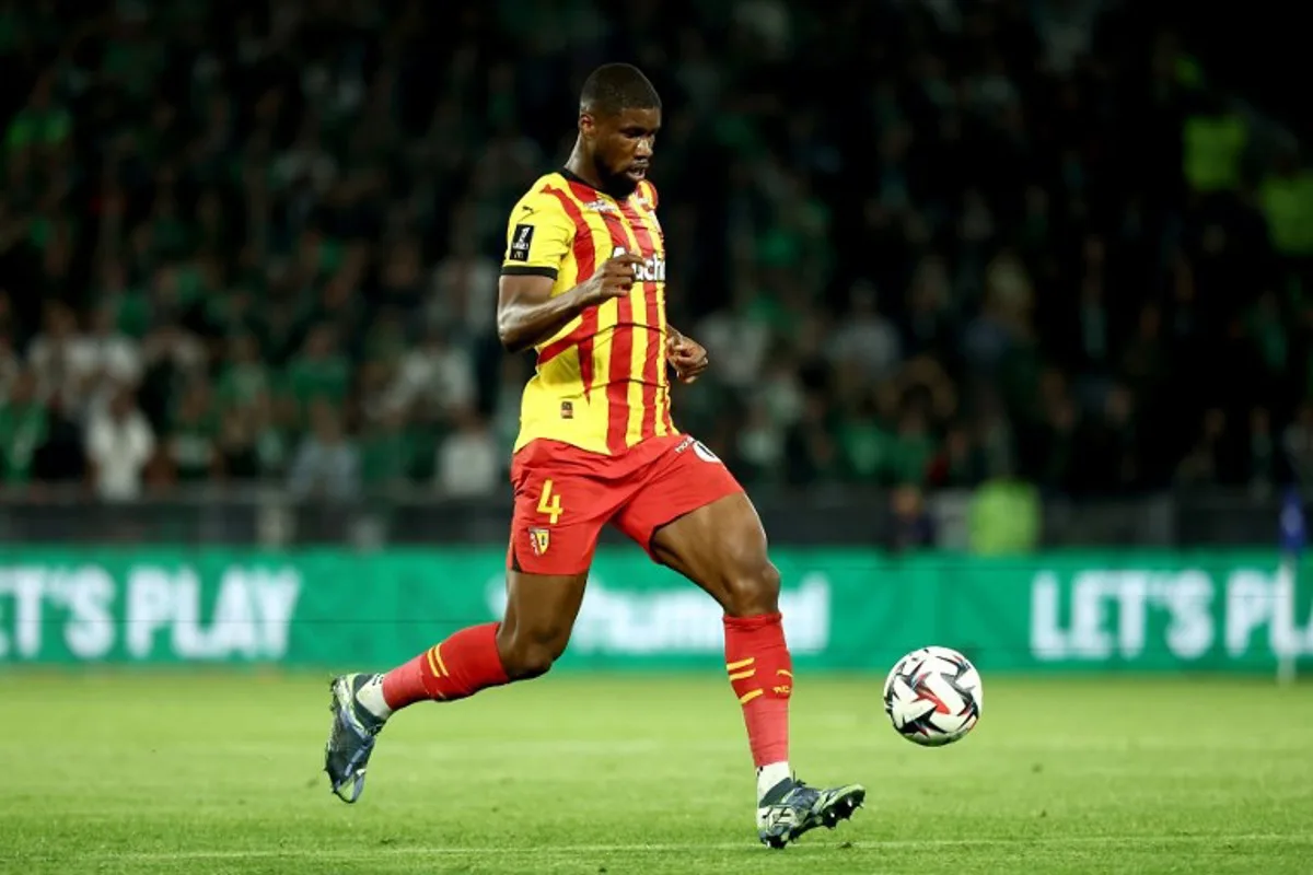 Lens' Austrian defender #4 Kevin Danso runs with the ball during the French L1 football match between AS Saint-Etienne and RC Lens at the Geoffroy-Guichard Stadium in Saint-Etienne, central France, on October 19, 2024.  Alex MARTIN / AFP