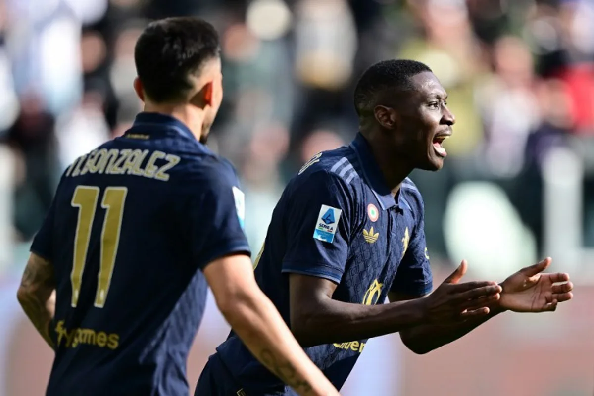 Juventus' French defender #20 Randal Kolo Muani celebrates after scoring a goal during the Italian Serie A football match between Juventus and Empoli at the "Allianz Stadium" in Turin, on February 2, 2025.   MARCO BERTORELLO / AFP