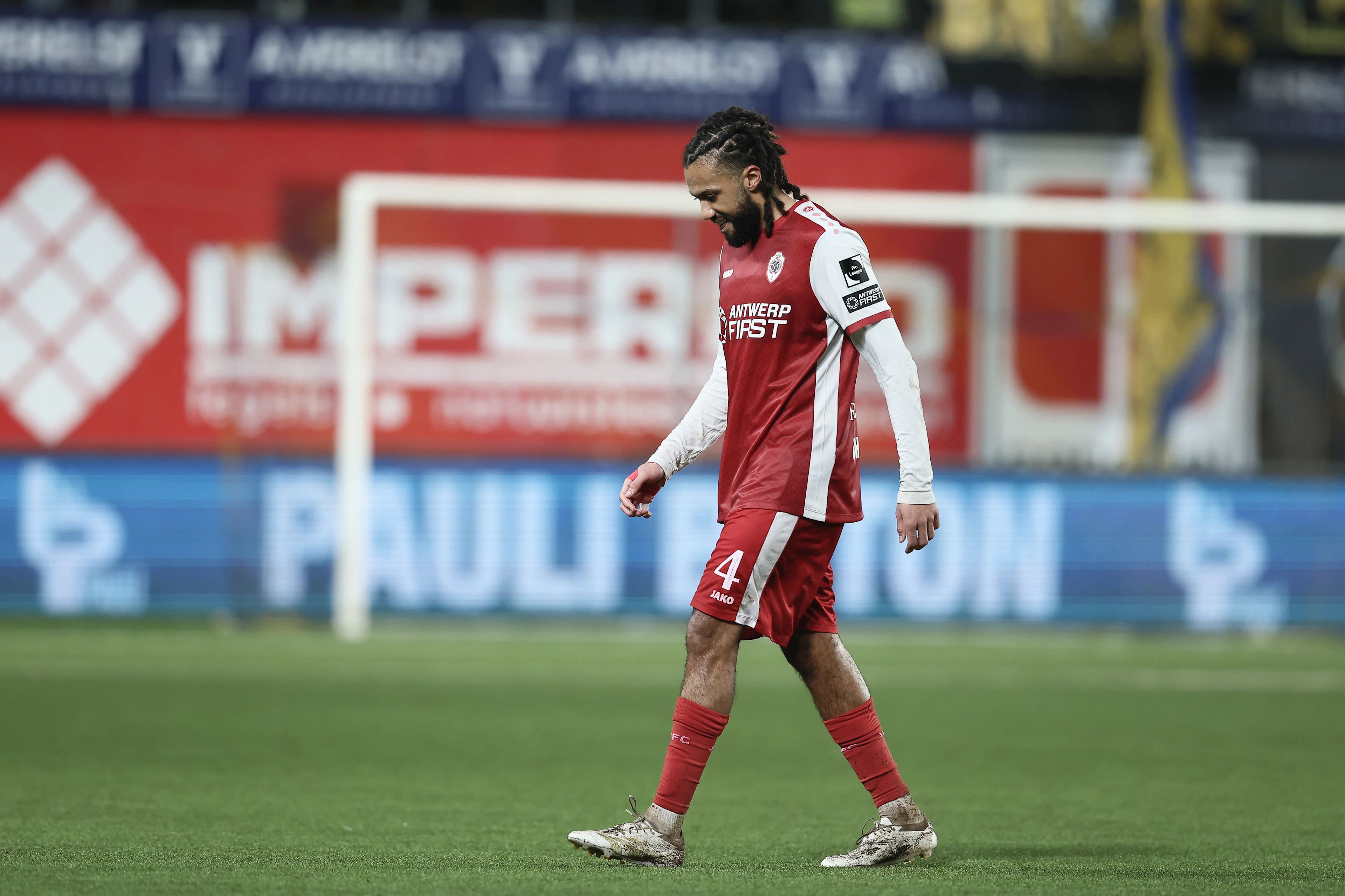 Antwerp's Jairo Riedewald leaves the field after receiving a red card during a soccer match between Sint-Truidense VV and Royal Antwerp FC, Friday 24 January 2025 in Sint-Truiden, on day 23 of the 2024-2025 season of the 'Jupiler Pro League' first division of the Belgian championship. BELGA PHOTO BRUNO FAHY