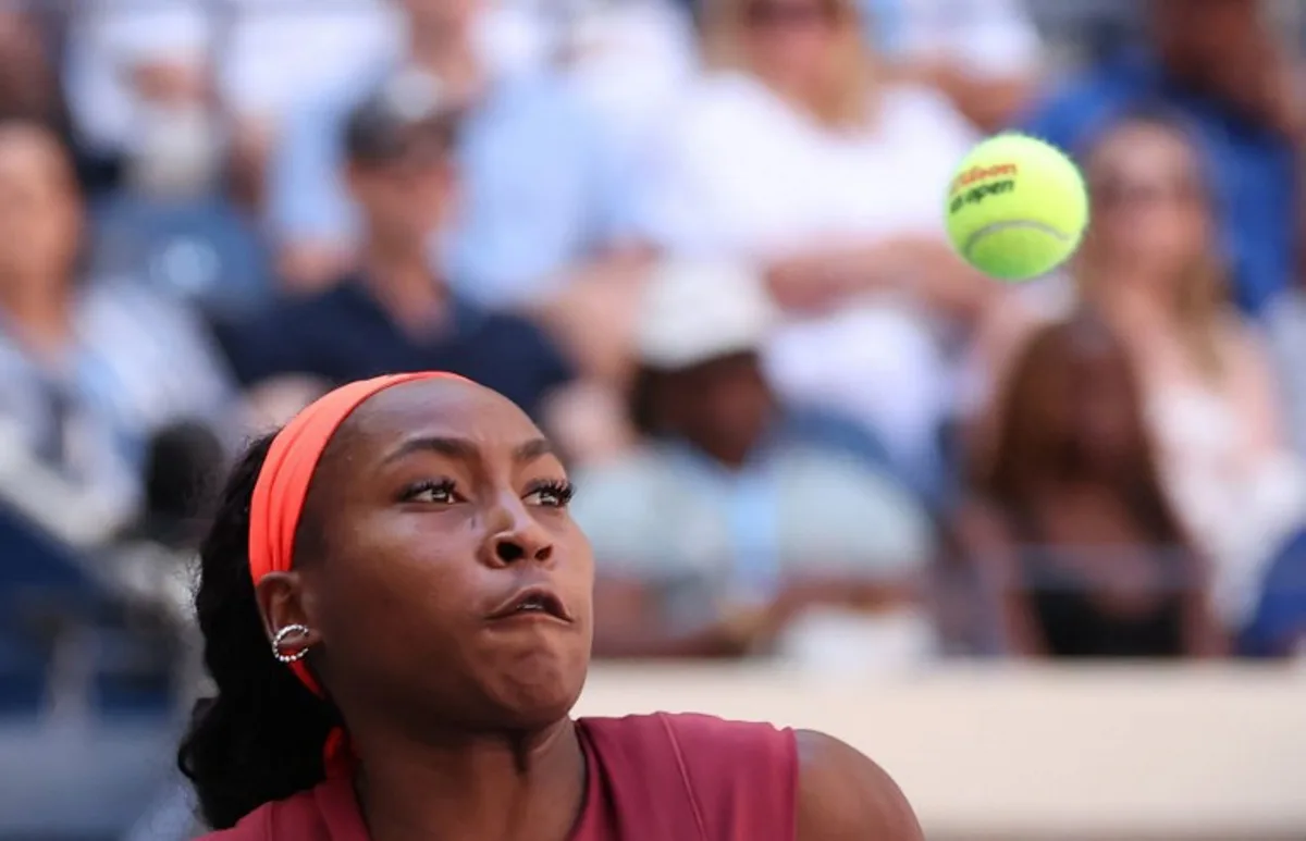 USA's Coco Gauff plays a shot to Poland's Magdalena Frech during their women's singles third round match on day seven of the US Open tennis tournament at the USTA Billie Jean King National Tennis Center in New York City on August 30, 2025. TIMOTHY A.CLARY / AFP