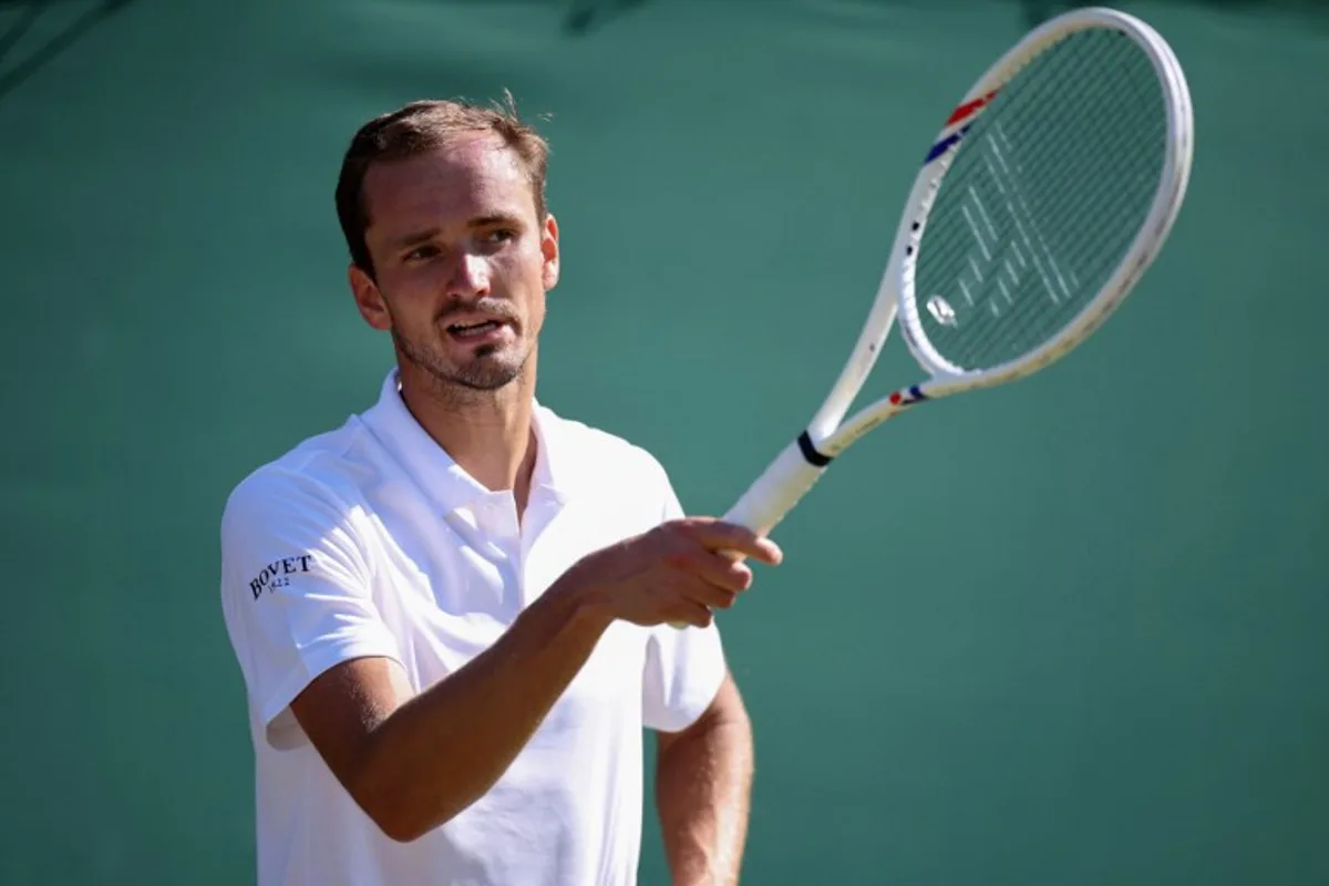 Russia's Daniil Medvedev reacts against Germany's Jan-Lennard Struff during their men's singles third round tennis match on the fifth day of the 2026 Wimbledon Championships at The All England Lawn Tennis and Croquet Club in Wimbledon, southwest London, on July 3, 2026.  Henry Nicholls / AFP