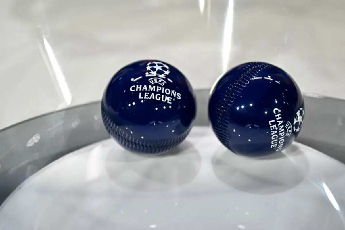 This photograph shows the draw balls bearing the competition logo ahead of the 2025-2026 UEFA Champions League round of 16, quarter-final and semi-final draw at the House of European Football in Nyon, western Switzerland on February 27, 2026. Harold CUNNINGHAM / AFP
