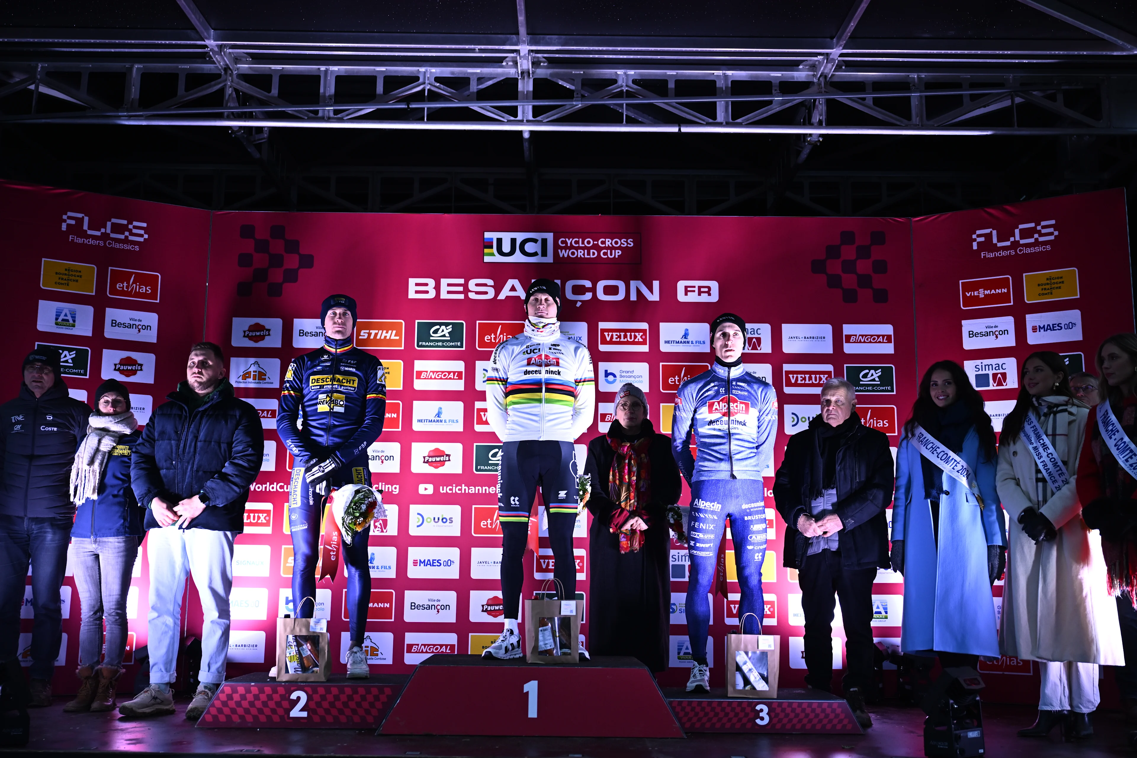 Belgian Toon Aerts, Dutch Mathieu Van Der Poel and Belgian Niels Vandeputte pictured on the podium after the men's elite race at the Cyclocross World Cup cyclocross event in Besancon, France, Sunday 29 December 2024, the eighth stage (out of 12) in the World Cup of the 2023-2024 season. BELGA PHOTO JASPER JACOBS