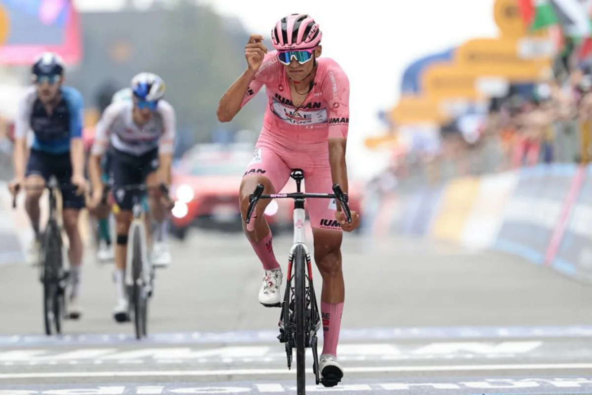 UAE Team Emirates XRG's Mexican rider Isaac Del Toro wearing the pink jersey of overall leader (Maglia Rosa) reacts as he crosses the finish line of the 20th stage of the 108th Giro d'Italia cycling race 205kms from Verres to Sestriere on May 31, 2025. Luca Bettini / AFP
