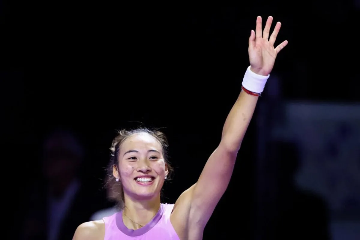 China's Zheng Qinwen reacts after winning against Italy's Jasmine Paolini during their women's singles tennis match at the WTA Finals Championship in Riyadh on November 6, 2024.  Fayez NURELDINE / AFP