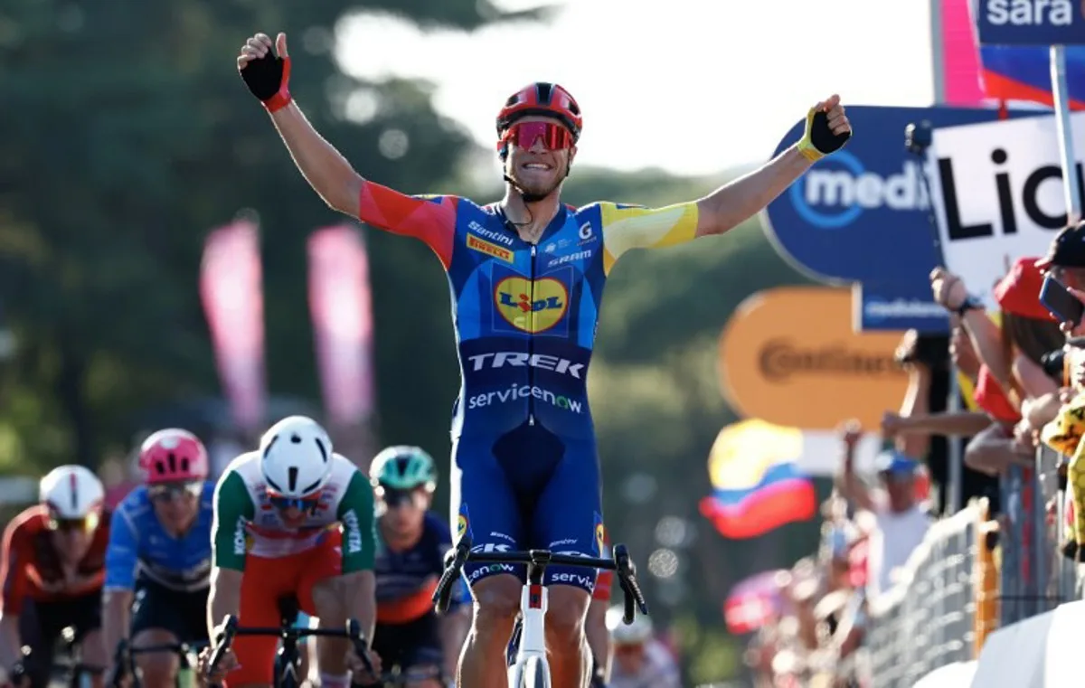 Lidl - Trek Italian rider Jonathan Milan celebrates as he crossing the finish line to win the 21th stage of the Giro d'Italia 2026 - Tour of Italy cycling race of 131km from Rome to Rome, Italy, on May 31, 2026. Luca Bettini / AFP