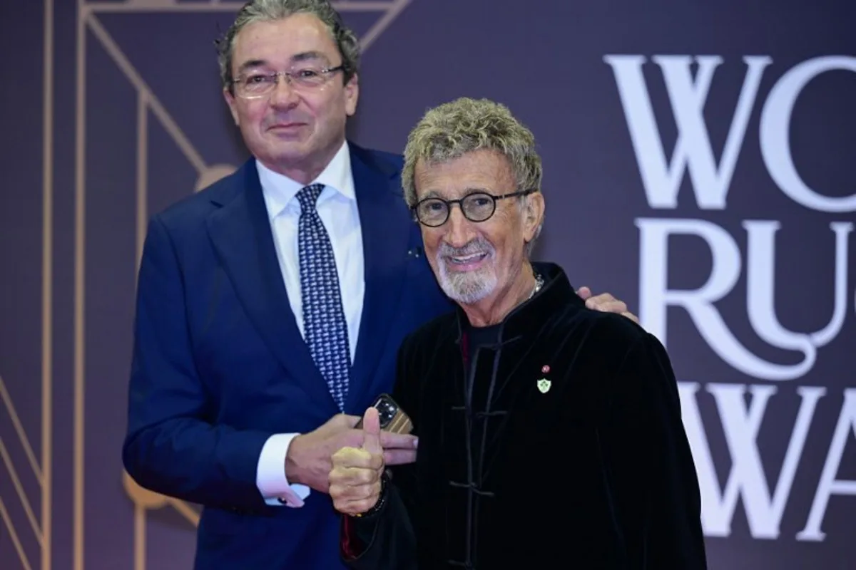 Irish businessman Eddie Jordan (R) poses on the red carpet of the 2024 World Rugby Awards ceremony at the Sporting Monte-Carlo complex in Monaco, on November 24, 2024.  Frederic Dides / AFP