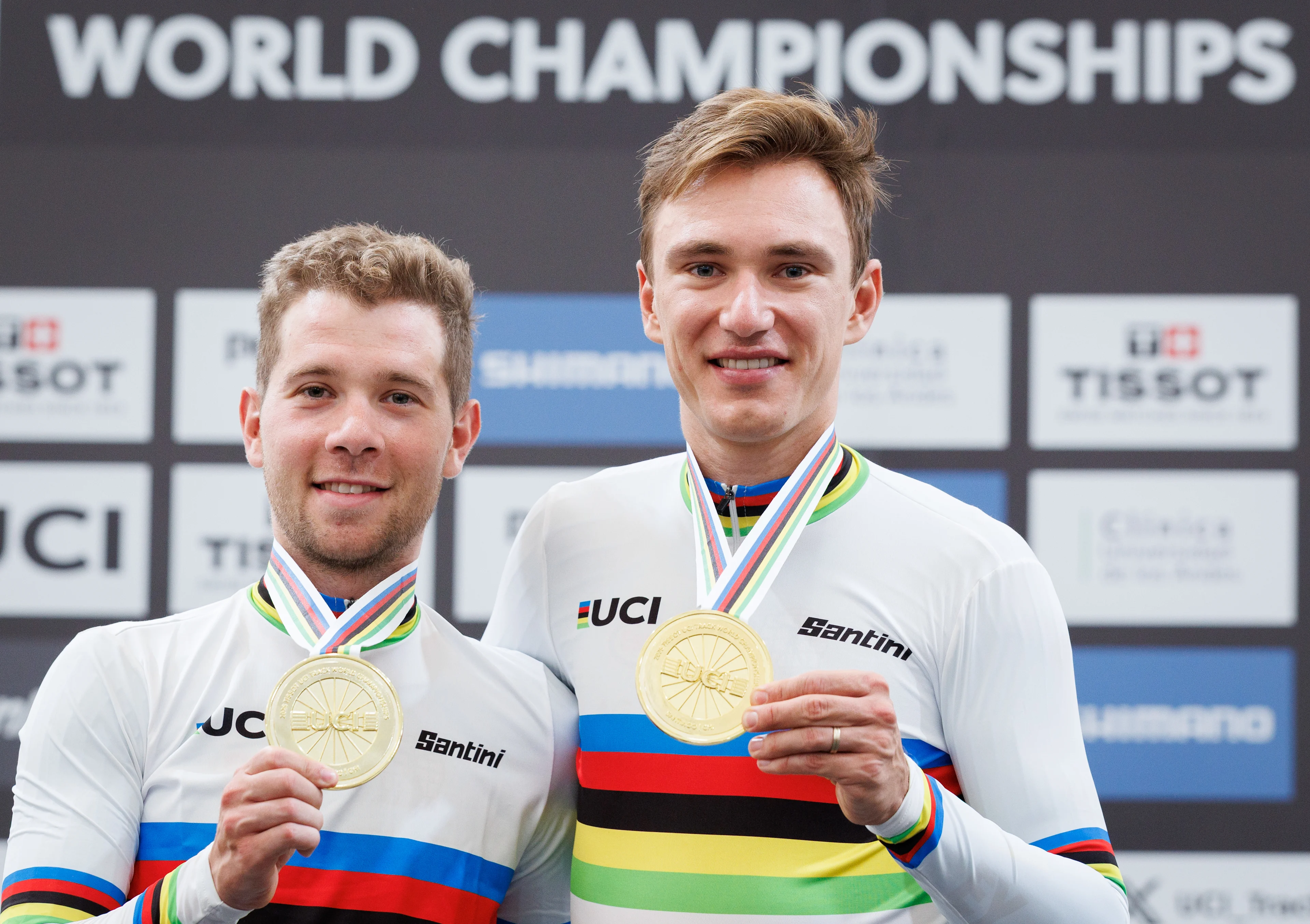 Belgian Fabio Van Den Bossche and Belgian Lindsay De Vylder celebrate on the podium after winning during the podium ceremony of the men's Madison race at the 2025 UCI Track World Championships cycling, in Santiago, Chile, Sunday 26 October 2025. The Track World Championships take place from 22 to 26 October at the Velodromo de Penalolen in Santiago, Chile. BELGA PHOTO BENOIT DOPPAGNE