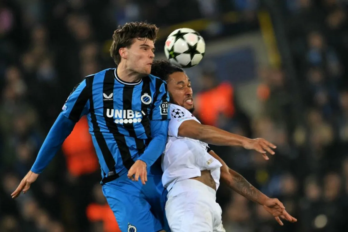 Club Brugge's Dutch defender #14 Bjorn Meijer (L) vies with Aston Villa's French midfielder #44 Boubacar Kamara (R) during the UEFA Champions League, league phase day 4, football match between Club Brugge and Aston Villa at the Jan Breydelstadion in Bruges on November 6, 2024.  NICOLAS TUCAT / AFP