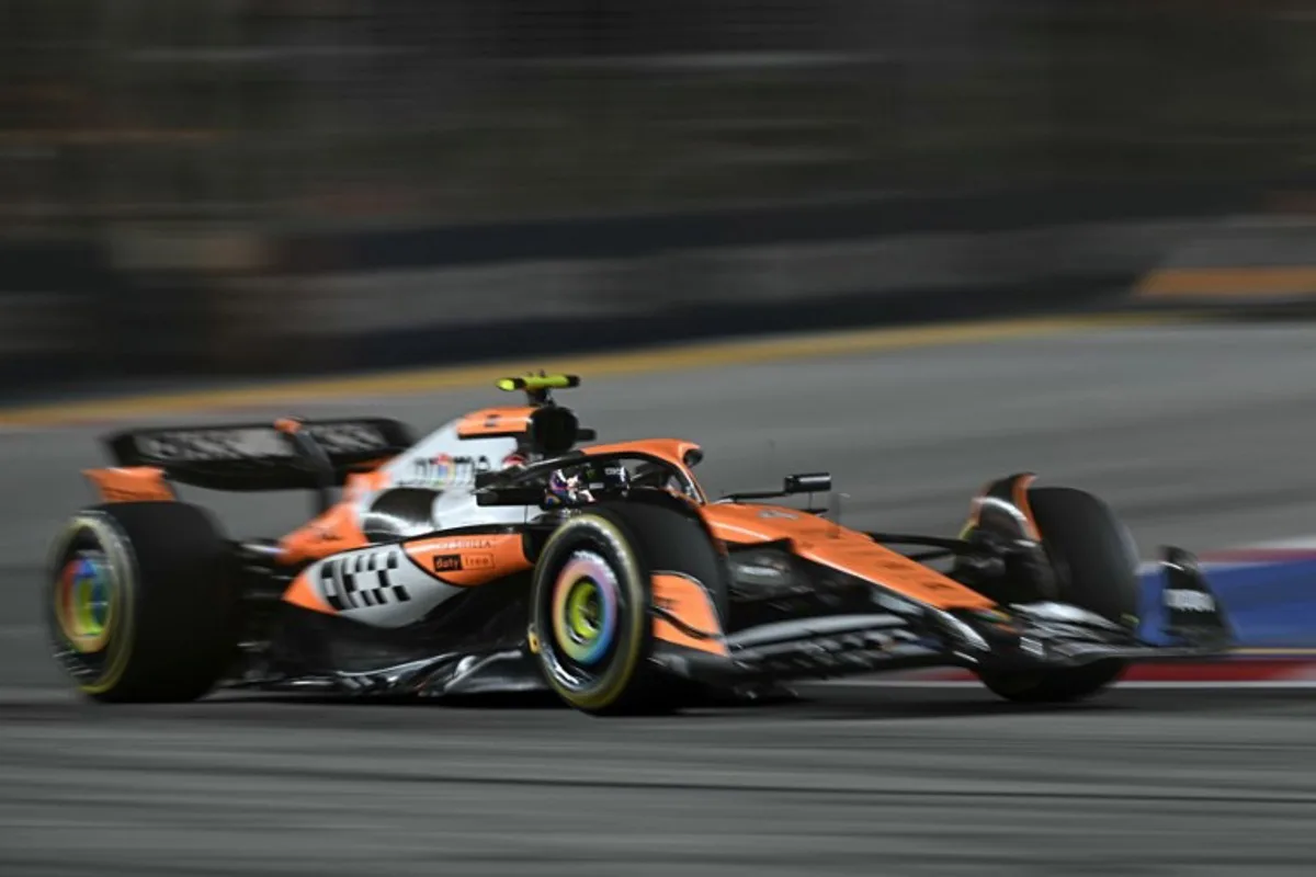 McLaren's British driver Lando Norris drives during the Formula One Singapore Grand Prix night race at the Marina Bay Street Circuit in Singapore on September 22, 2024.  Lillian SUWANRUMPHA / AFP