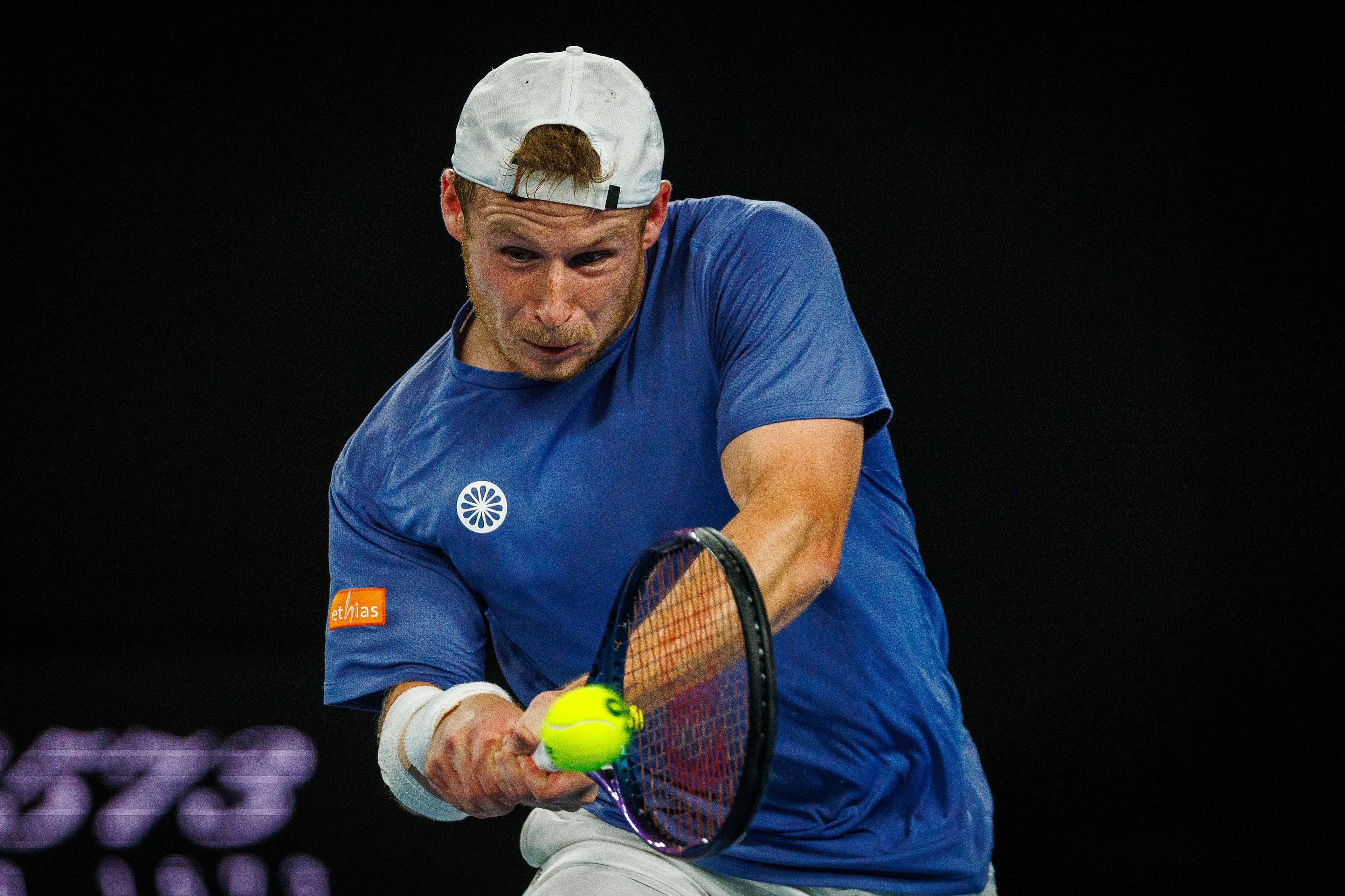 Belgian Gauthier Onclin pictured in action during a men's singles first round game between Belgian Onclin and American Opelka, at the 'Australian Open' Grand Slam tennis tournament, Sunday 12 January 2025 in Melbourne Park, Melbourne, Australia. The 2025 edition of the Australian Grand Slam takes place from January 12th to January 26th. BELGA PHOTO PATRICK HAMILTON