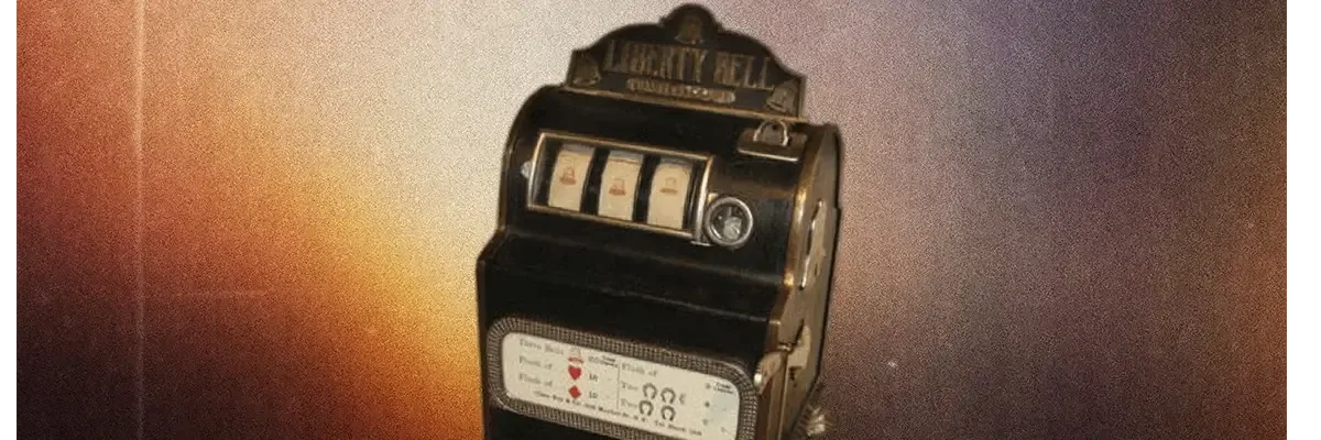 First Liberty Bell slot machine by Charles Fey, featuring three mechanical reels and iconic bell symbols.