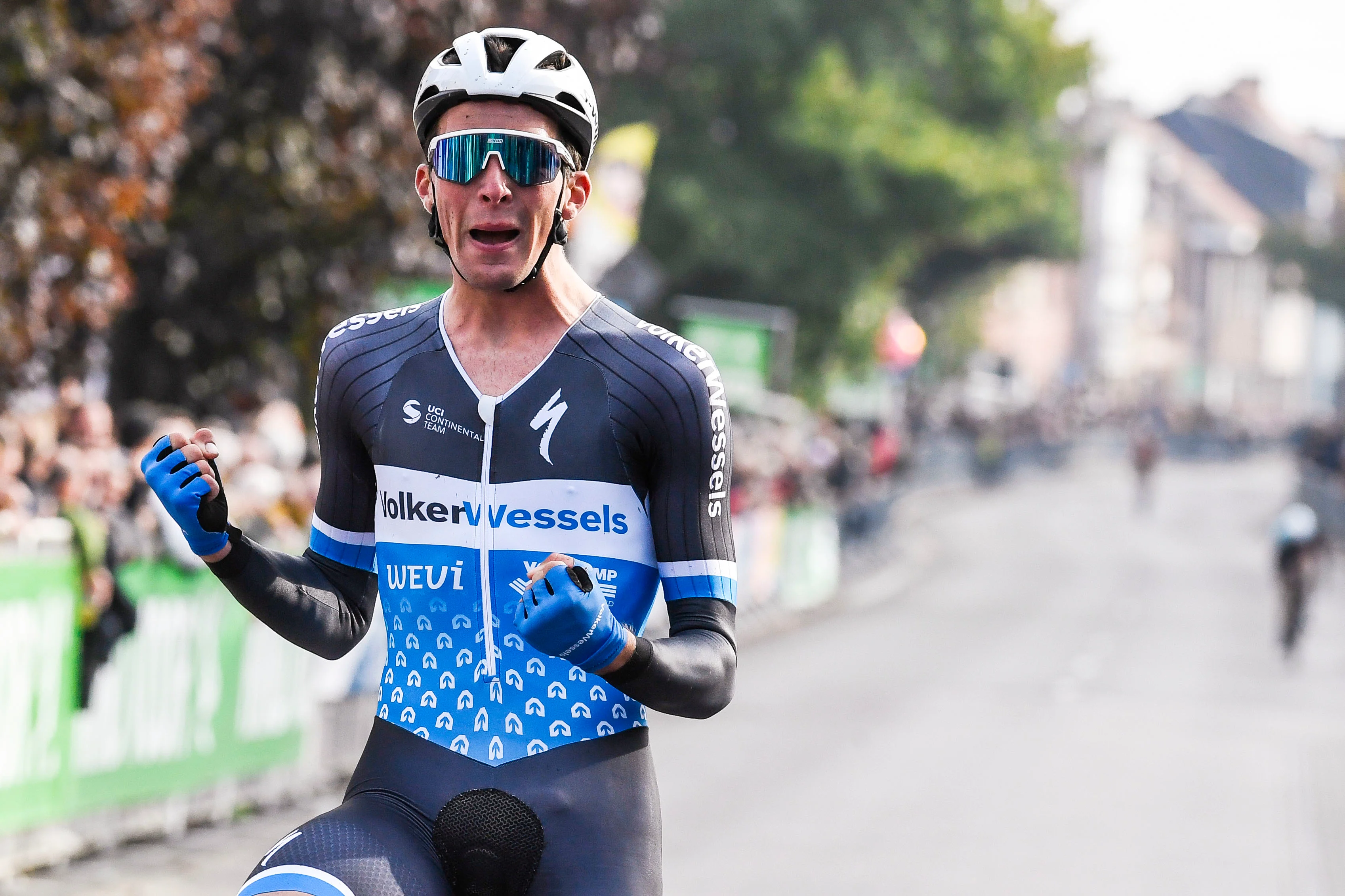 Dutch Timo De Jong of Volkerswessels Cycling Team celebrates as he crosses the finish line at the 2024 edition of the 'Nationale Sluitingsprijs' one day cycling race in Putte-Kapellen, Kapellen on Tuesday 15 October 2024. BELGA PHOTO GOYVAERTS