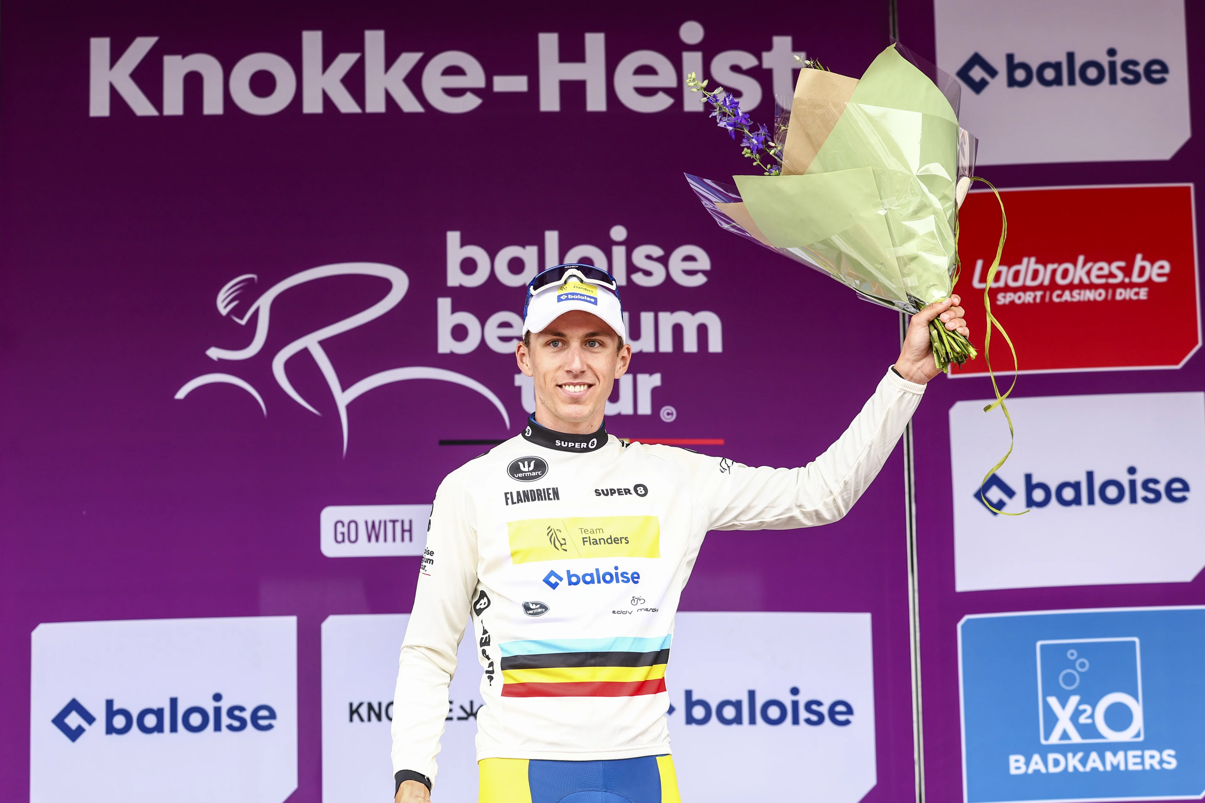 Belgian Lars Craps of Team Flanders Baloise pictured on the podium after the second stage of the Baloise Belgium Tour cycling race, 184,2 km from Merelbeke to Knokke-Heist, on Thursday 13 June 2024. BELGA PHOTO DAVID PINTENS