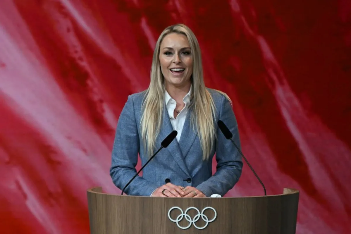 US former alpine skiing champion Lindsey Vonn speaks during the Salt Lake City bid for the 2034 Winter Games during the 142nd session of the International Olympic Committee (IOC) in Paris on July 24, 2024, ahead of the Paris 2024 Olympic Games.  Fabrice COFFRINI / AFP