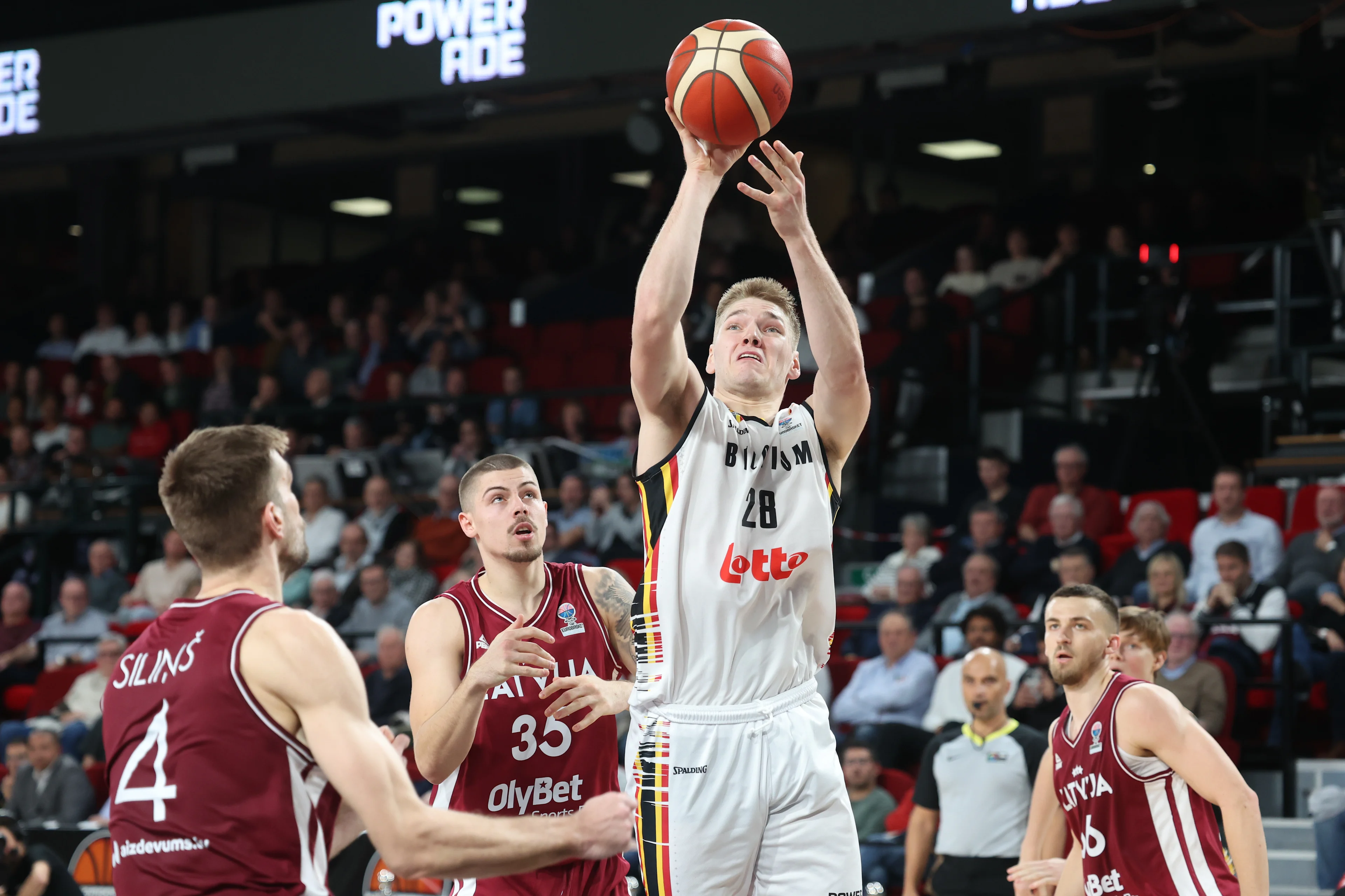 Latvian Ojars Silins and Belgium's Thijs De Ridder fight for the ball during a basketball match between Belgium's national team Belgian Lions and Latvia, Monday 25 November 2024 in Charleroi, game 4/6 in the group stage of the qualifications for the Eurobasket 2025 European championships. BELGA PHOTO VIRGINIE LEFOUR