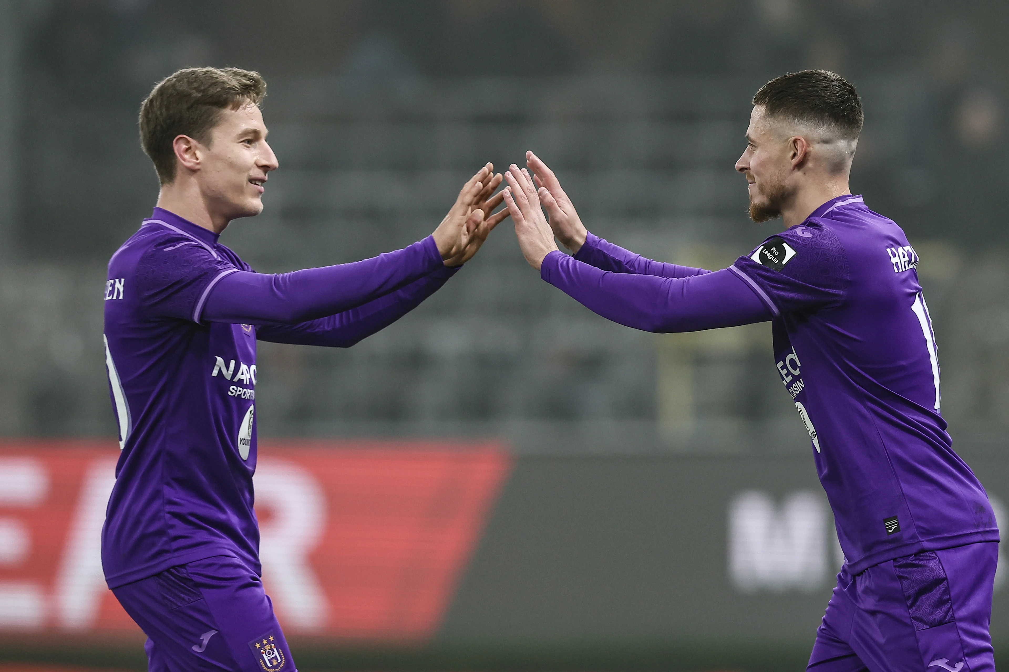 Anderlecht's Yari Verschaeren and Anderlecht's Thorgan Hazard pictured during a soccer match between RSC Anderlecht and FCV Dender EH, Friday 27 December 2024 in Brussels, a game of day 20 of the 2024-2025 season of the 'Jupiler Pro League' first division of the Belgian championship. The competition was re-branded as the 'Younited Pro League' for the games of matchweek 20, to shine a light on the Younited Belgium charity. BELGA PHOTO BRUNO FAHY