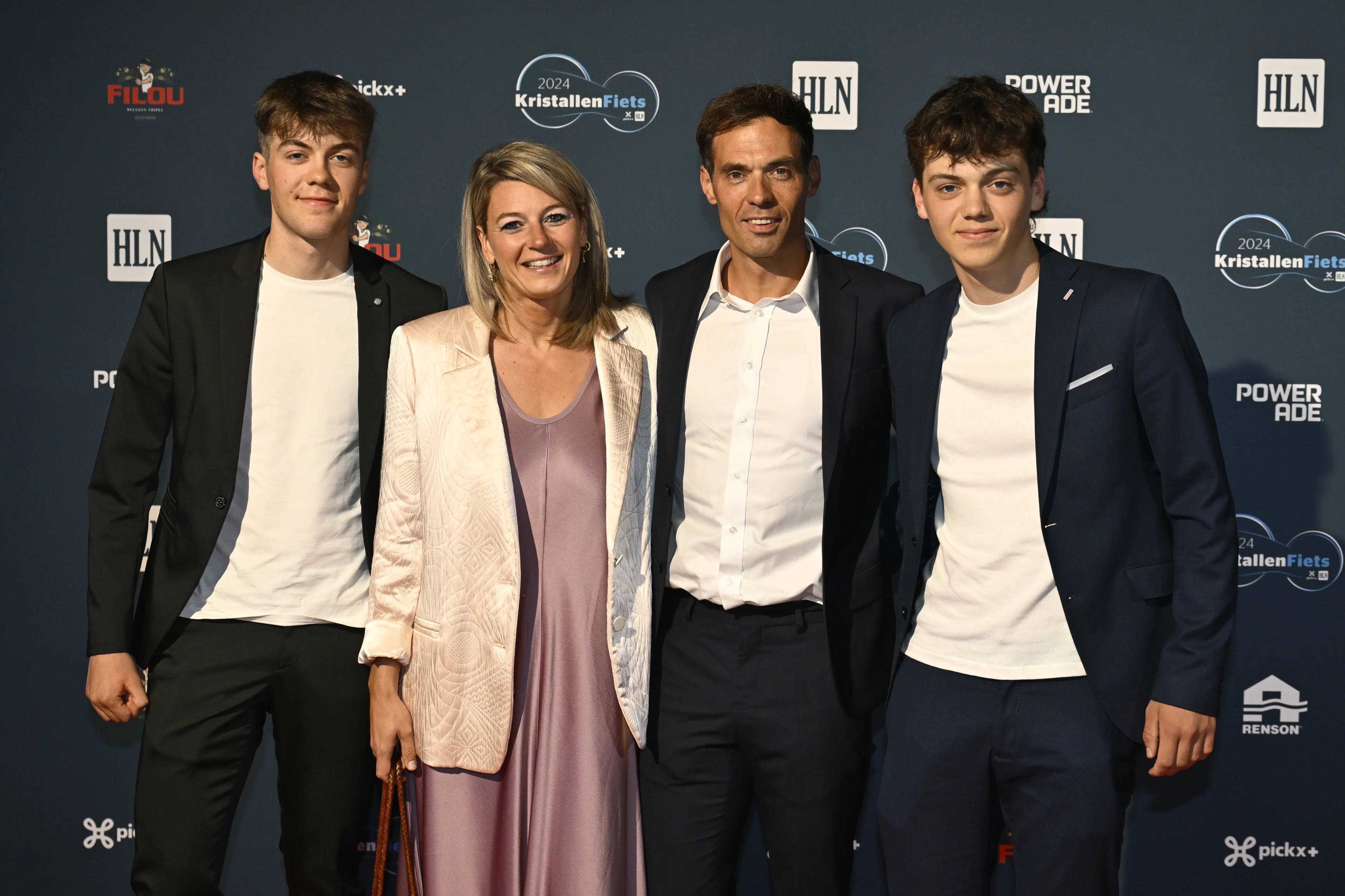 Belgian national cycling coach Sven Vanthourenhout, Celine Maenhout, Stan and Seppe pictured on the red carpet at the arrival for the 'Kristallen Fiets' (Crystal Bike - Velo de Cristal) award ceremony for the best cyclists of the 2024 cycling season, organized by Flemish newspaper Het Laatste Nieuws, Tuesday 15 October 2024, in Kruisem. BELGA PHOTO DIRK WAEM