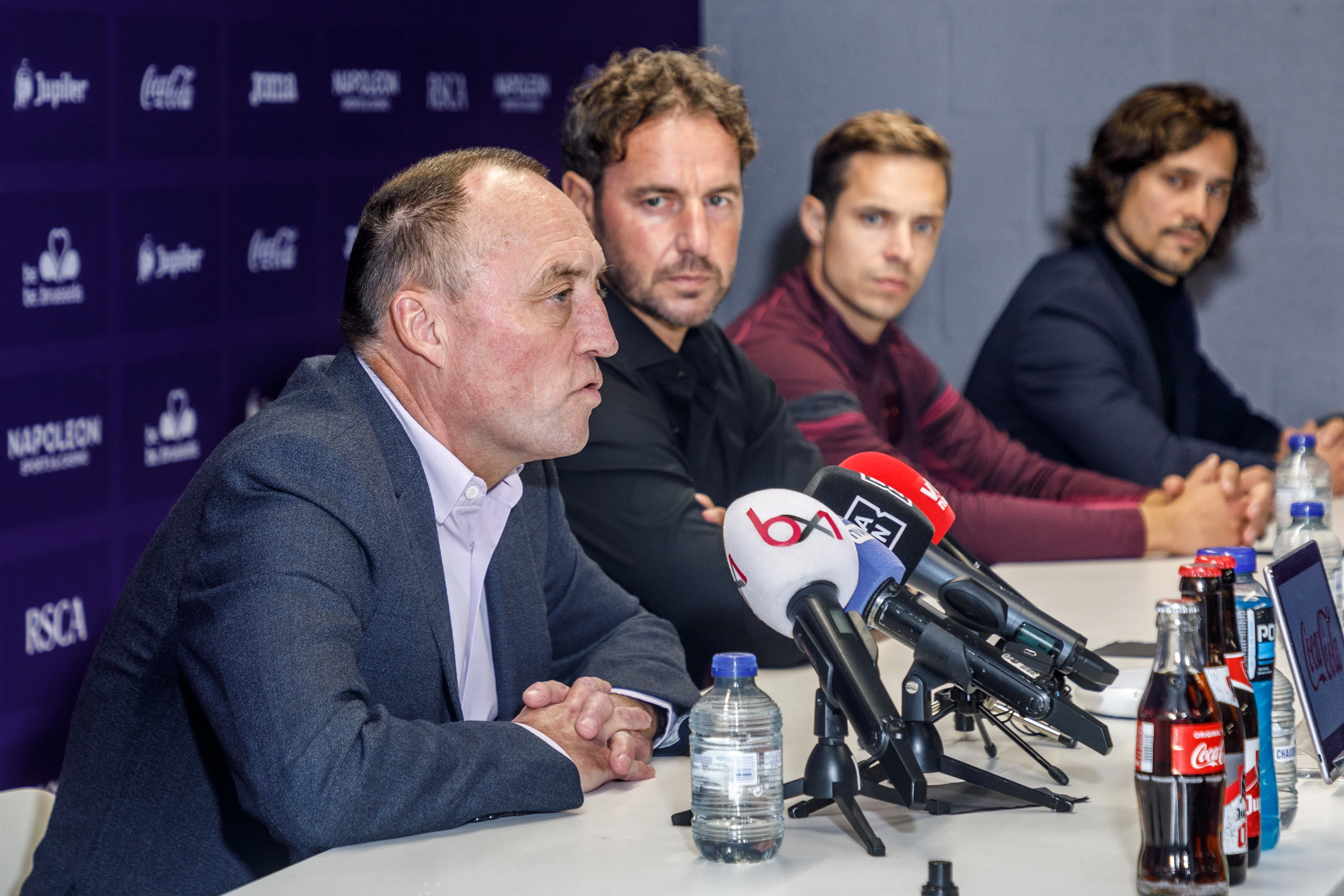 Anderlecht's chairman Wouter Vandenhaute, Anderlecht's new sport director Olivier Renard, Anderlecht's head coach David Hubert and Anderlecht's spokesman Mathias Declercq pictured during the weekly press conference of Belgian soccer team RSC Anderlecht, Wednesday 30 October 2024 in Brussels, to discuss the next game in the national competition but also with a announce of the club chairman regarding a change of the sport director. BELGA PHOTO HATIM KAGHAT