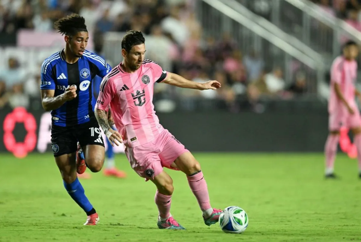 Inter Miami's Argentine forward #10 Lionel Messi and CF Montreal's Canadian midfielder #19 Nathan Saliba vie for the ball during the Major League Soccer match between Inter Miami CF and CF Montreal at Chase Stadium in Fort Lauderdale, Florida, on May 28, 2025. CHANDAN KHANNA / AFP
