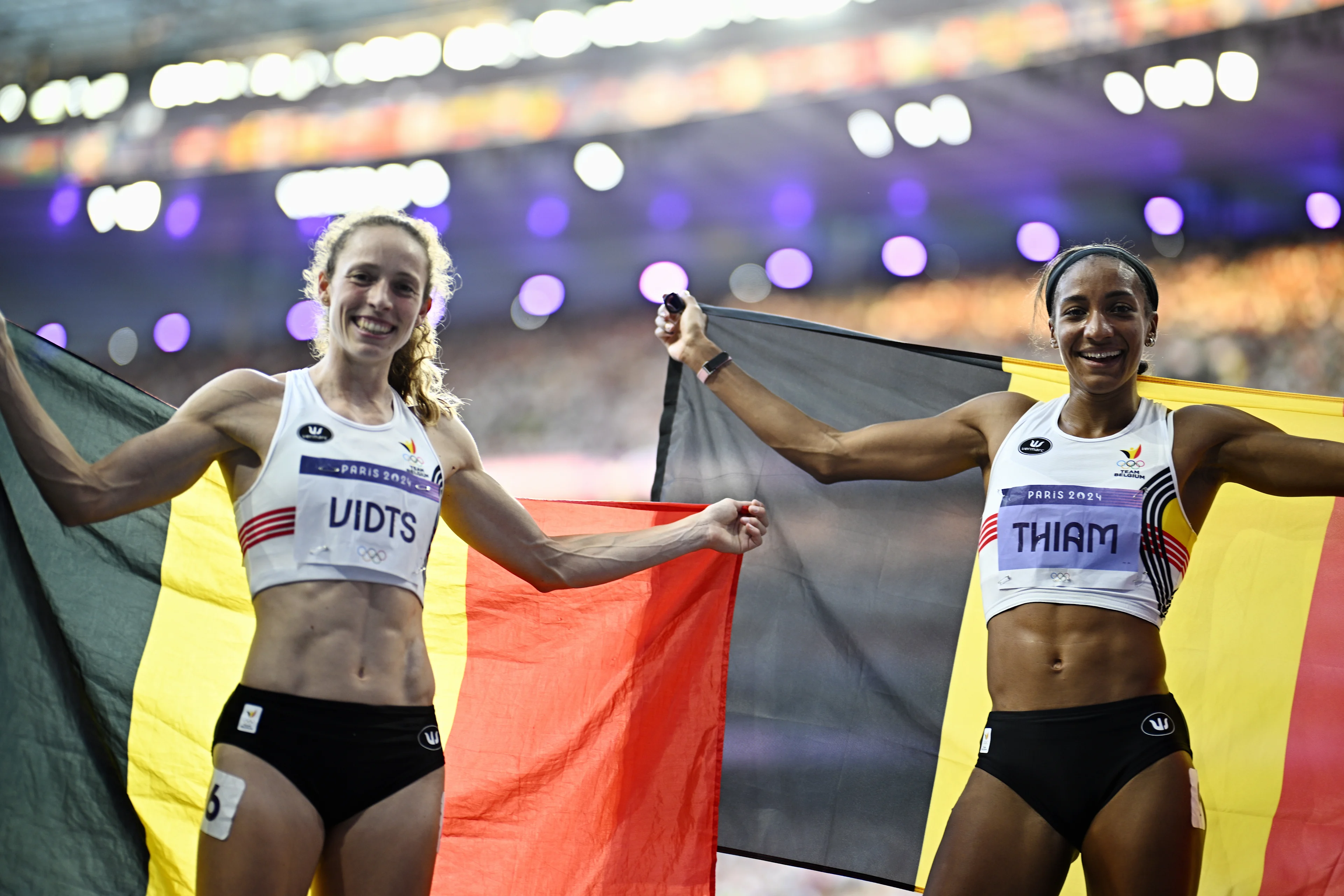 Belgian athlete Noor Vidts and Belgian athlete Nafissatou Nafi Thiam celebrate after winning the bronze and gold medal in the women's heptathlon at the athletics competition at the Paris 2024 Olympic Games, on Friday 09 August 2024 in Paris, France. The Games of the XXXIII Olympiad are taking place in Paris from 26 July to 11 August. The Belgian delegation counts 165 athletes competing in 21 sports. BELGA PHOTO JASPER JACOBS