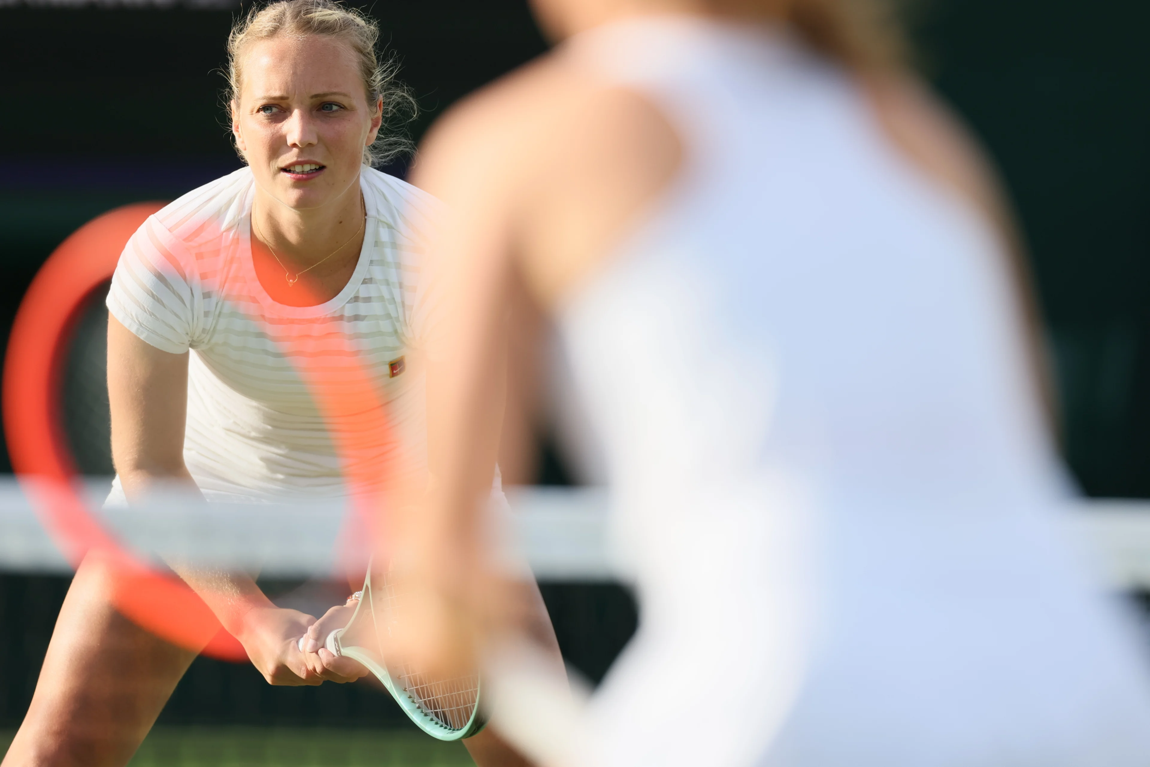 Belgian Kimberley Zimmermann pictured during a doubles tennis match with Czech pair Kolodziejova - Siskova versus US-Belgian pair Davis - Zimmermann, in round 1 of the women's doubles of the 2024 Wimbledon grand slam tournament at the All England Tennis Club, in south-west London, Britain, Thursday 04 July 2024. BELGA PHOTO BENOIT DOPPAGNE