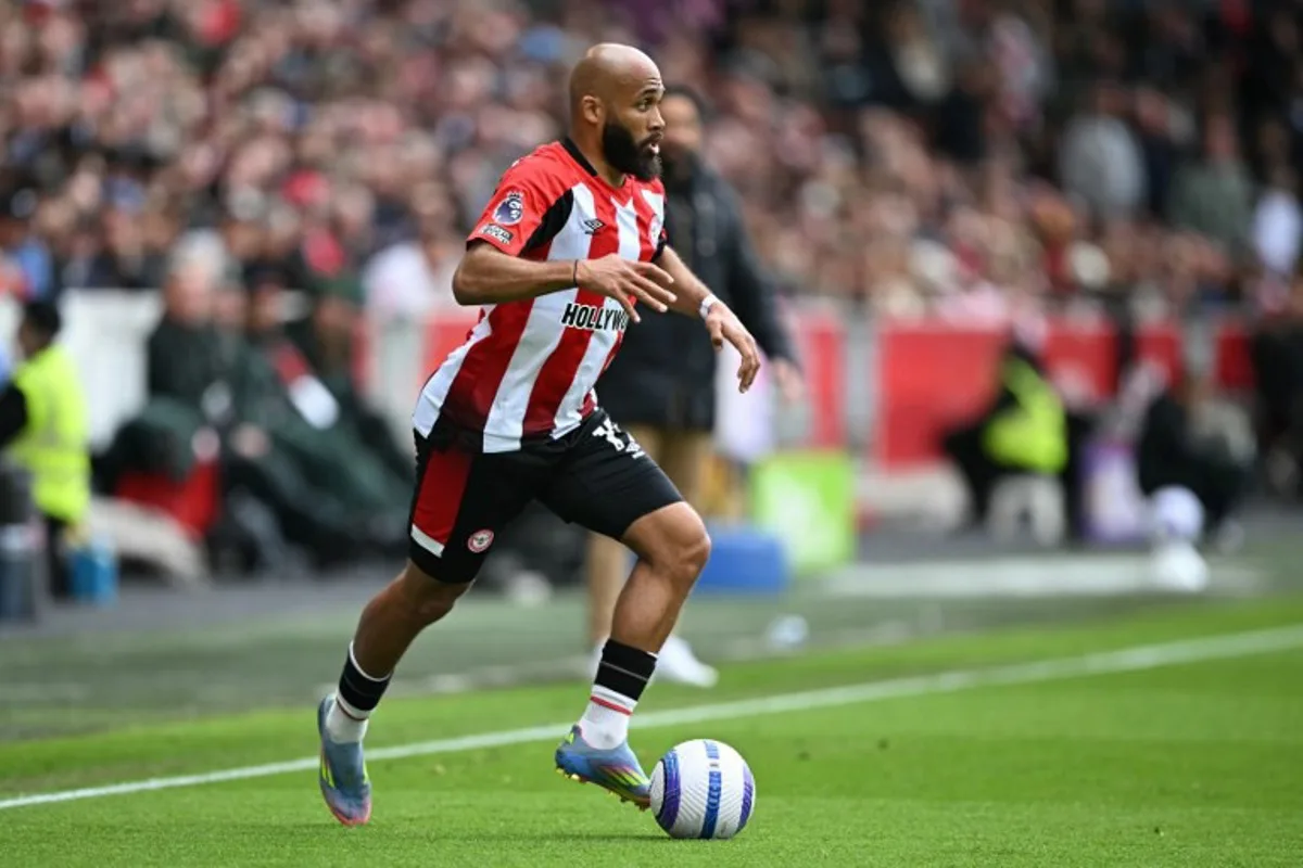 Brentford's French-born Cameroonian striker #19 Bryan Mbeumo runs with the ball during the English Premier League football match between Brentford and Manchester United at the Gtech Community Stadium in London on May 4, 2025. JUSTIN TALLIS / AFP