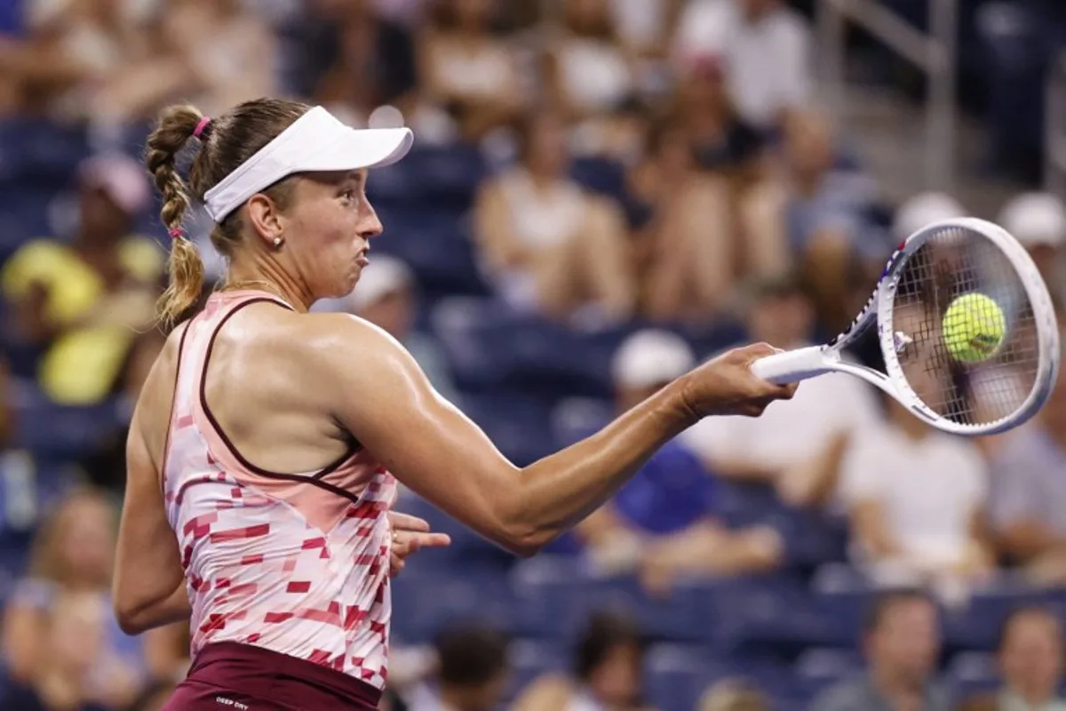 Belgium's Elise Mertens returns the ball to Belarus's Aryna Sabalenka during their women's singles round of 16 tennis match on day seven of the US Open tennis tournament at the USTA Billie Jean King National Tennis Center in New York City, on September 1, 2024.  Kena Betancur / AFP