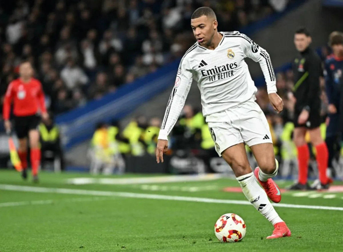 Real Madrid's French forward #09 Kylian Mbappe controls the ball during the Spanish Copa del Rey (King's Cup) last 16 first leg football match between Real Madrid CF and RC Celta de Vigo at the Santiago Bernabeu stadium in Madrid on January 16, 2025.  JAVIER SORIANO / AFP