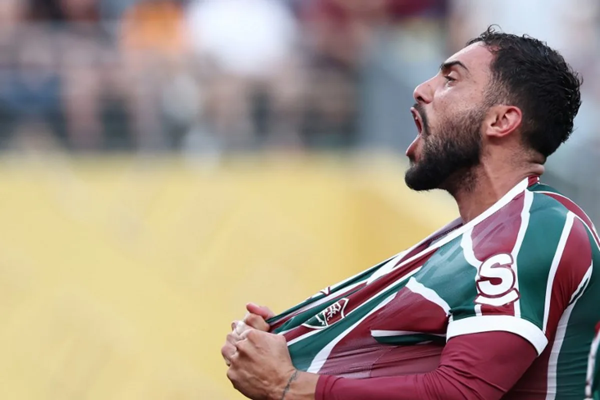 Fluminense's Argentine defender #22 Juan Pablo Freytes celebrates after scoring his team's third goal during the FIFA Club World Cup 2025 Group F football match between Brazil's Fluminense and South Korea's Ulsan HD at the MetLife stadium in East Rutherford, New Jersey on June 21, 2025. FRANCK FIFE / AFP