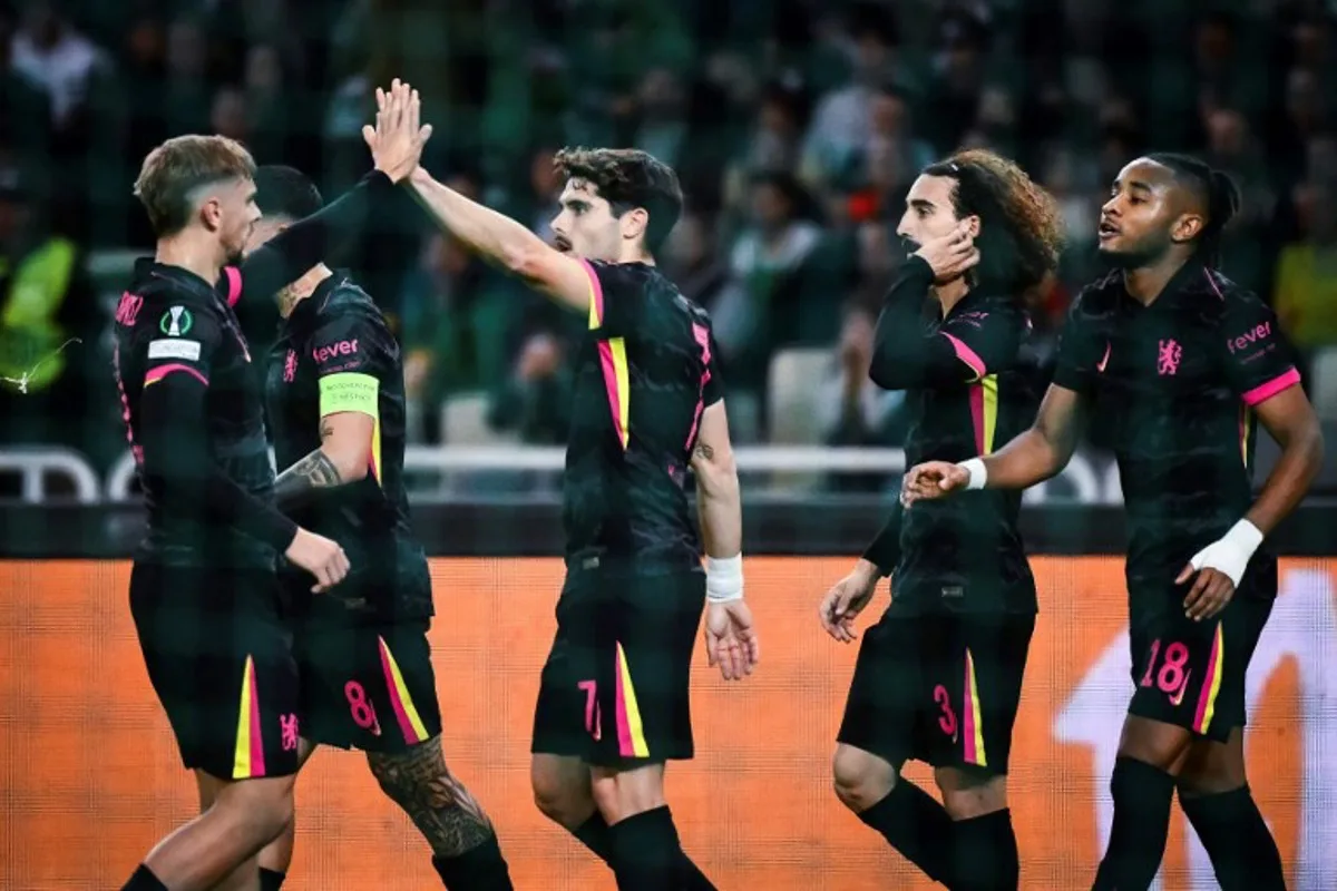 Chelsea's players celebrate after scoring during the UEFA Conference League, League Phase - Matchday 2, football match between Panathinaikos FC and Chelsea FC at the Olympic Athletic Center in Athens on October 24, 2024.  Angelos TZORTZINIS / AFP