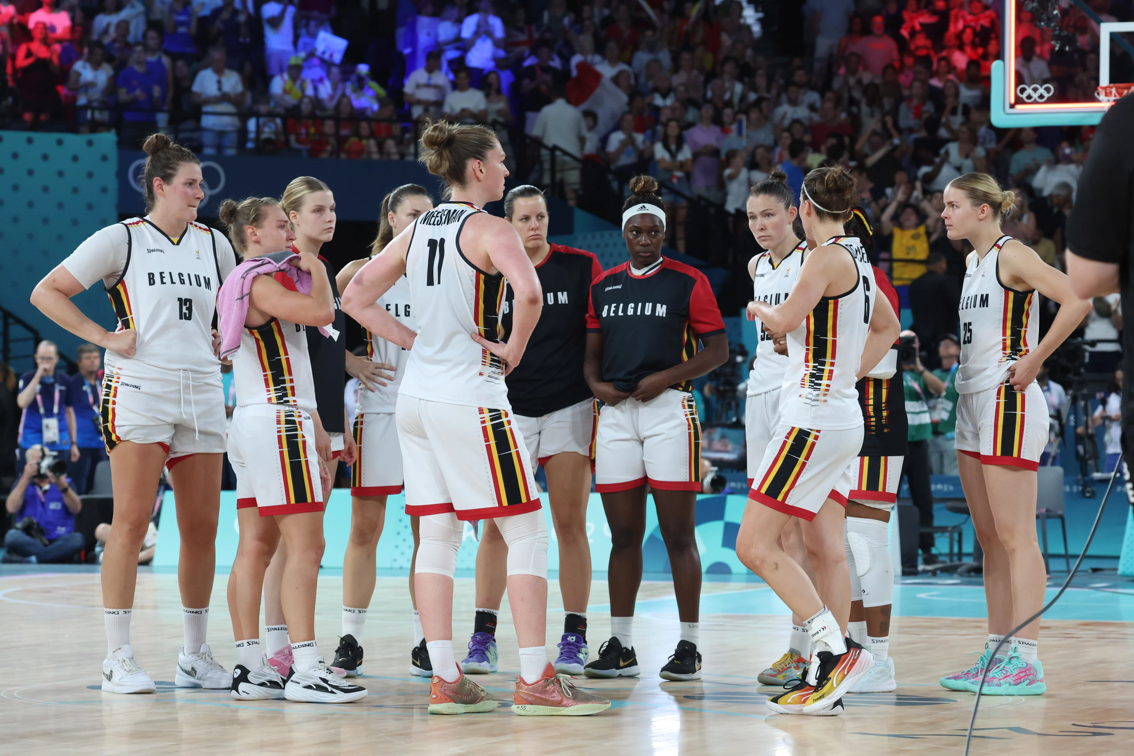 Belgian Cats' players react after a basketball game between Australia and Belgian national team the Belgian Cats, the bronze medal game of the women's tournament at the Paris 2024 Olympic Games, on Sunday 11 August 2024 in Paris, France. The Games of the XXXIII Olympiad are taking place in Paris from 26 July to 11 August. The Belgian delegation counts 165 athletes competing in 21 sports. BELGA PHOTO VIRGINIE LEFOUR