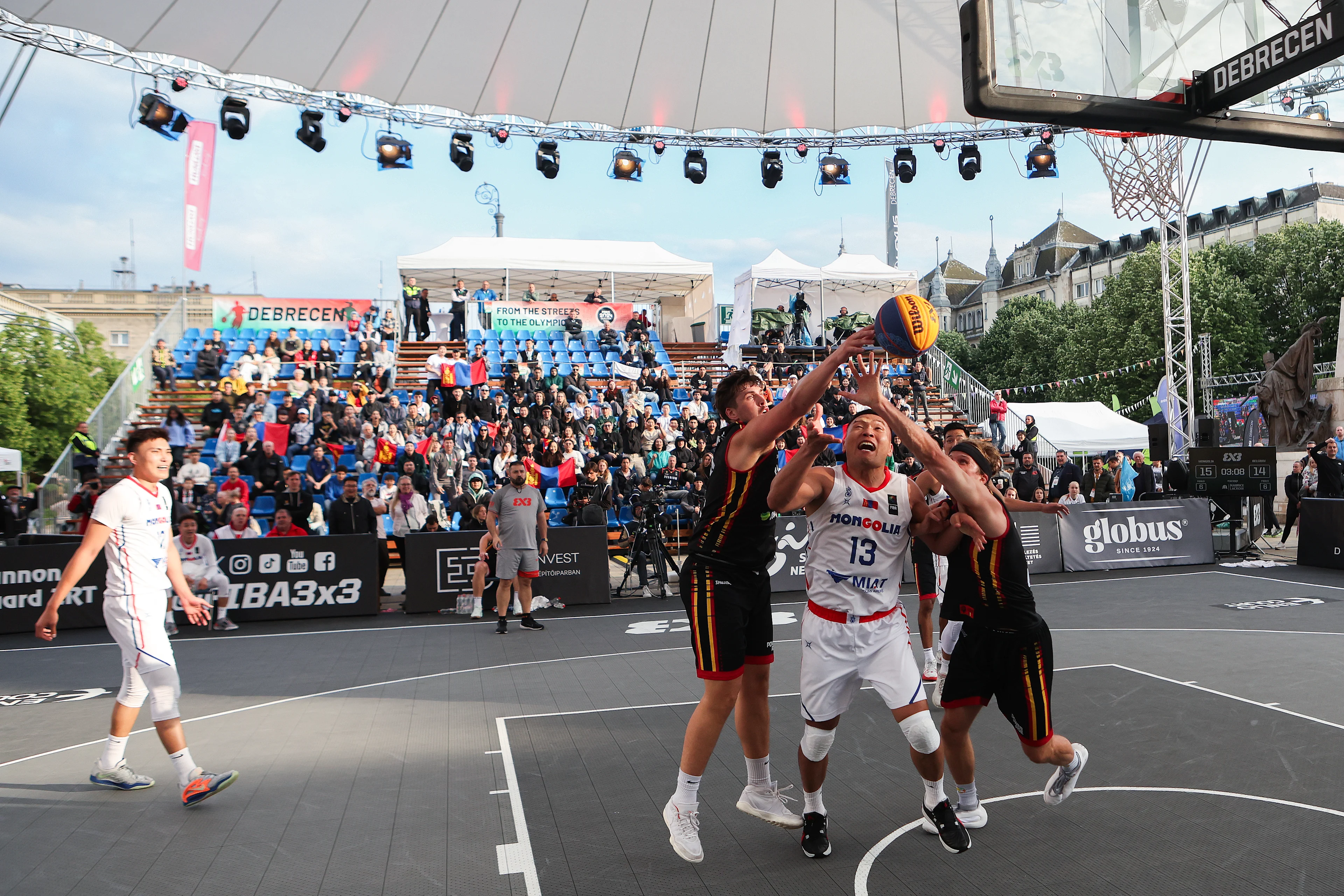 Mongolian Delgernyam Davaasambuu, Belgian Thibaut Vervoort and Belgian Jonas Foerts are pictured in action during a game between Belgium and Mongolia in the group D, at the Olympic qualification tournament for the 2024 Olympics, in Debrecen, Hungary, Friday 17 May 2024. BELGA PHOTO NIKOLA KRSTIC