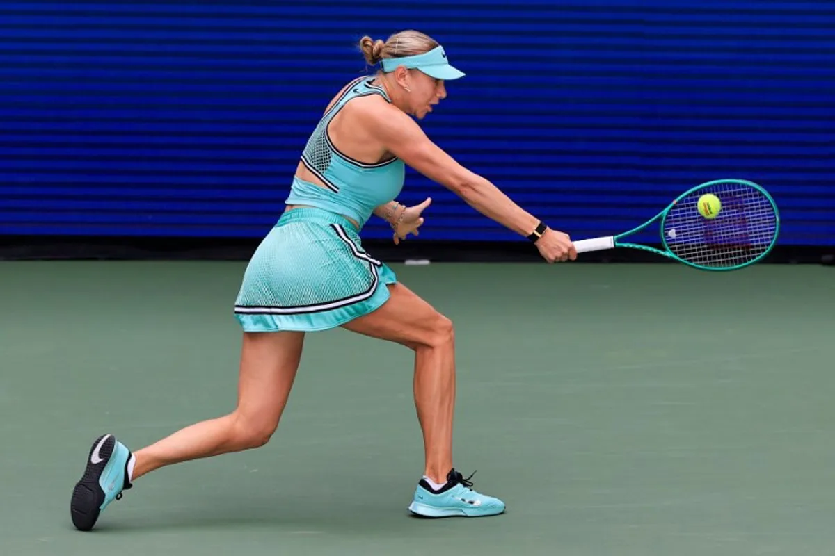 USA's Amanda Anisimova hits a return to Austria's Anastasia Potapova during their women's singles third round tennis match on day seven of the US Open tennis tournament at the USTA Billie Jean King National Tennis Center in New York City on September 5, 2026. TIMOTHY A. CLARY / AFP