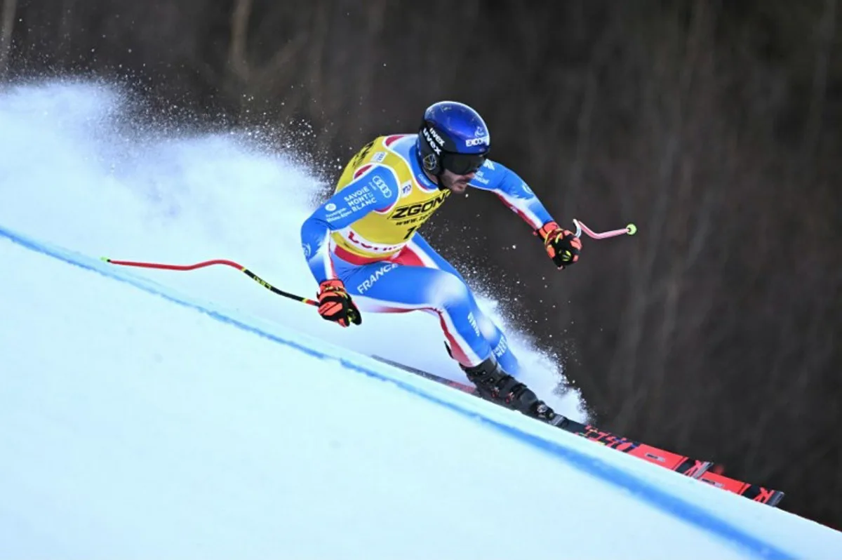 France's Cyprien Sarrazin skies during a training session before his crash, ahead of the Men's downhill race of the FIS Alpine Skiing World Cup event, in Bormio on December 27, 2024. Cyprien Sarrazin suffered a heavy fall on December 27 during the second training session before the World Cup downhill in Bormio (Italy) which he won just a year ago. Fabrice COFFRINI / AFP