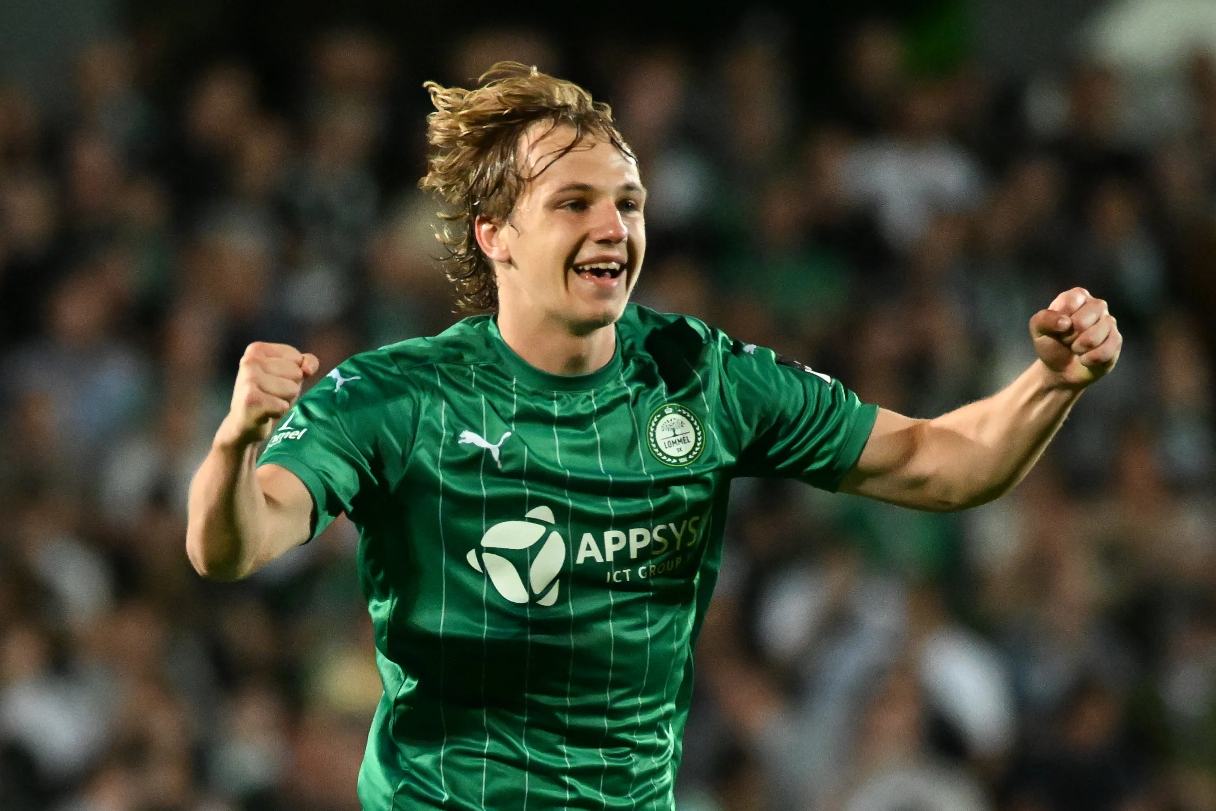 Lommel's Sam De Grand celebrates after scoring during a soccer game between Lommel SK and Beerschot VA, Saturday 02 May 2026 in Lommel, on the first leg of the Final of the Promotion Play-Offs of the 2025-2026 'Challenger Pro League' 1B second division of the Belgian championship. BELGA PHOTO JILL DELSAUX