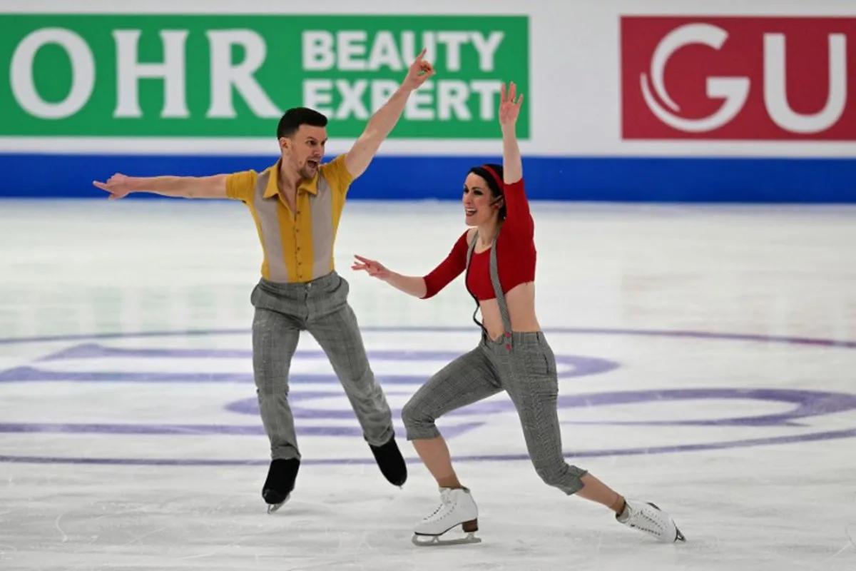 Italy's Charlene Guignard and Marco Fabbri compete during the pairs Ice Dance event of the ISU Figure Skating European Championships in Tallinn, Estonia on January 31, 2025.  Daniel MIHAILESCU / AFP