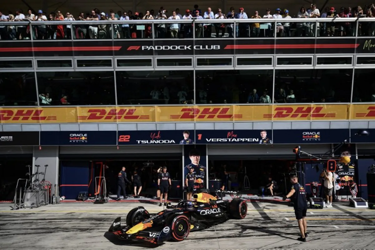 Red Bull Racing's Dutch driver Max Verstappen sits in his car in the pit during the qualifying session ahead of the Italian Formula One Grand Prix at the Autodromo Nazionale Monza circuit, in Monza, northern Italy, on September 6, 2025. Marco BERTORELLO / POOL / AFP