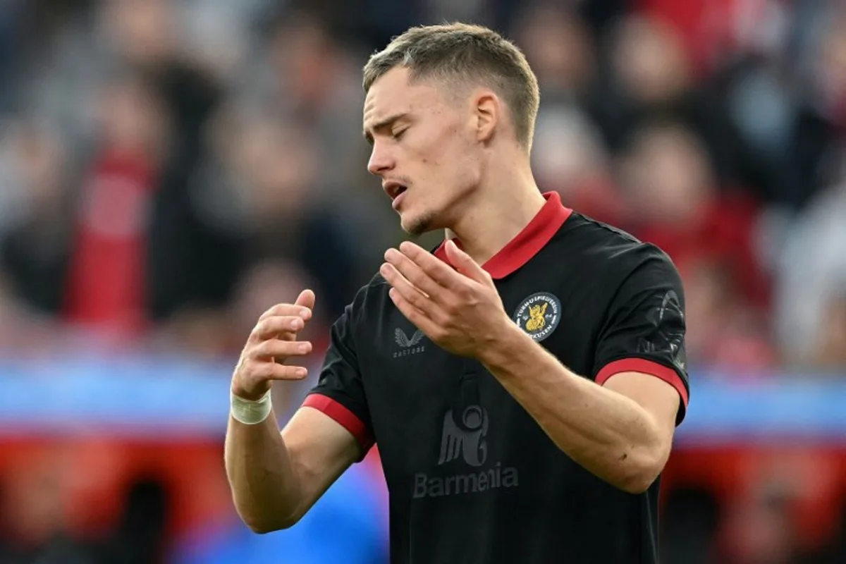 Bayer Leverkusen's German midfielder #10 Florian Wirtz reacts during the German first division Bundesliga football match between Bayer 04 Leverkusen and Holstein Kiel in Leverkusen, western Germany on October 5, 2024.  INA FASSBENDER / AFP