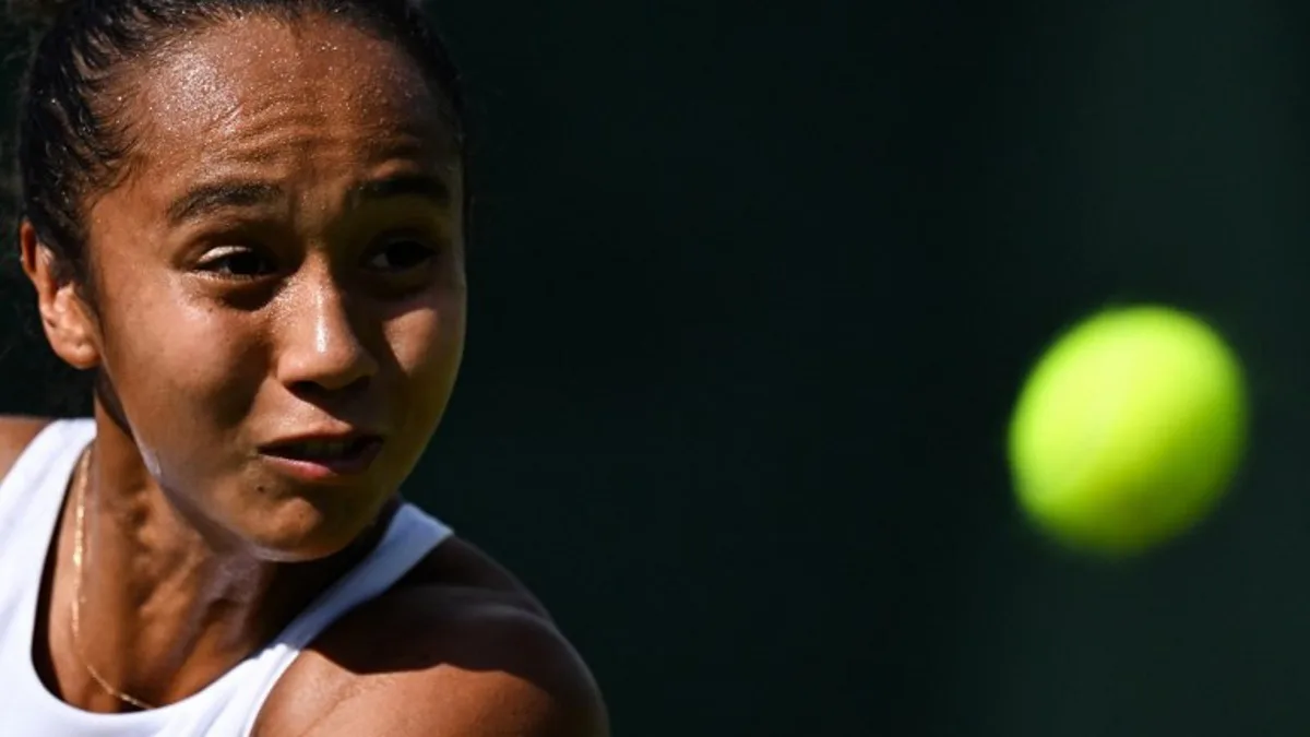 Canada's Leylah Fernandez eyes the ball as she returns it to Britain's Hannah Klugman during their women's singles first round tennis match on the first day of the 2025 Wimbledon Championships at The All England Lawn Tennis and Croquet Club in Wimbledon, southwest London, on June 30, 2025. Kirill KUDRYAVTSEV / AFP