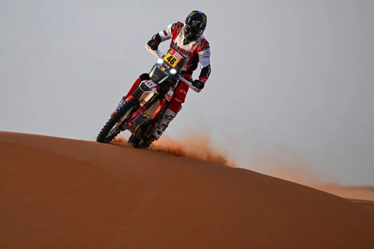 Hero Motosports Team Rally's Botswanan biker Ross Branch rides in the dunes during the stage 8 of the 2024 Dakar Rally between Al Duwadimi and Hai, Saudi Arabia, on January 15, 2024.  PATRICK HERTZOG / AFP