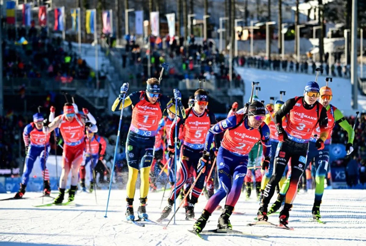 France's Quentin Fillon Maillet (3rd R) and other athletes take the start to the single mixed relay event of the IBU Biathlon World Cup in Oberhof on January 12, 2025.  Tobias SCHWARZ / AFP