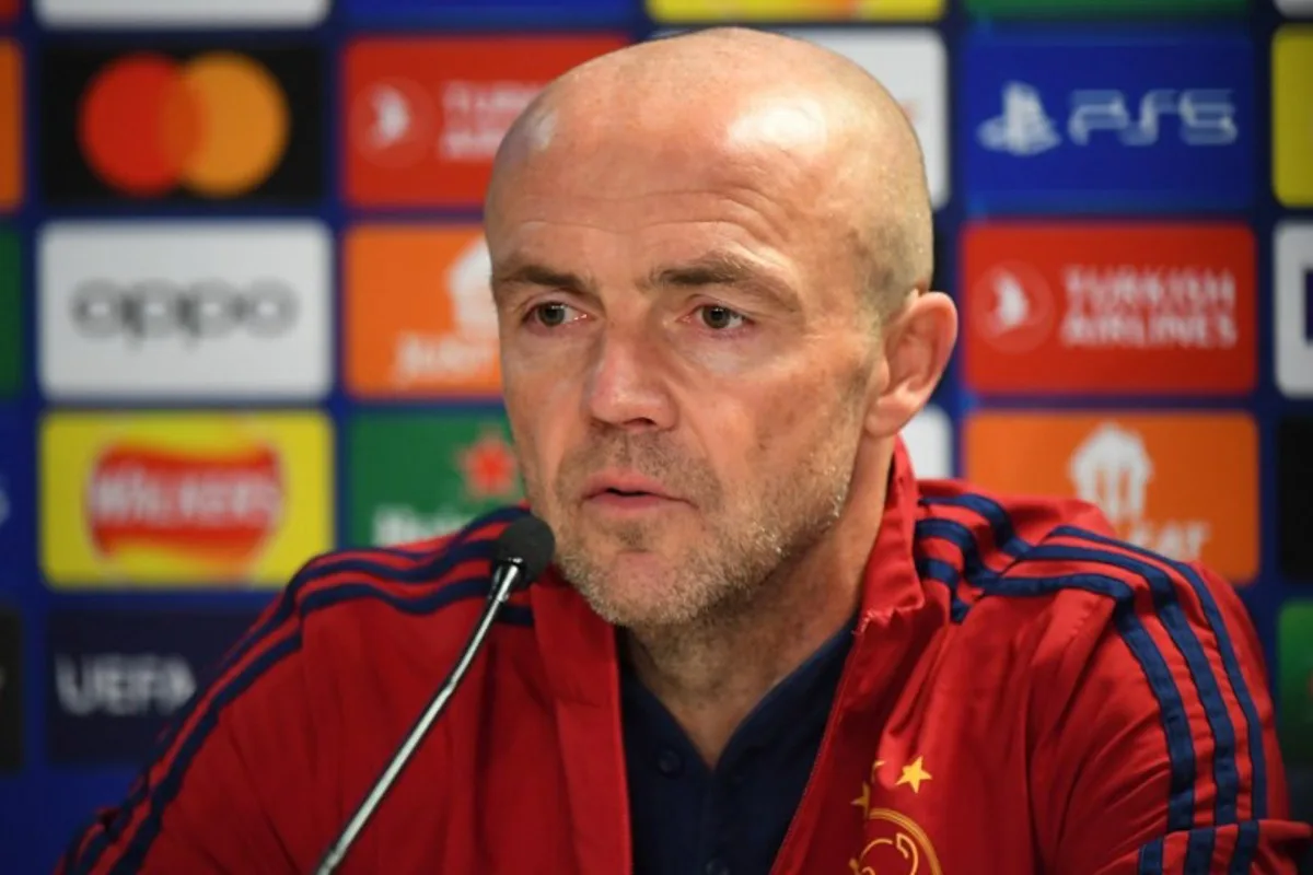 Ajax Dutch head coach Alfred Schreuder speaks during a press conference at Ibrox Stadium in Glasgow on October 31, 2022, on the eve of their UEFA Champions League Group A football match against Rangers.   ANDY BUCHANAN / AFP
