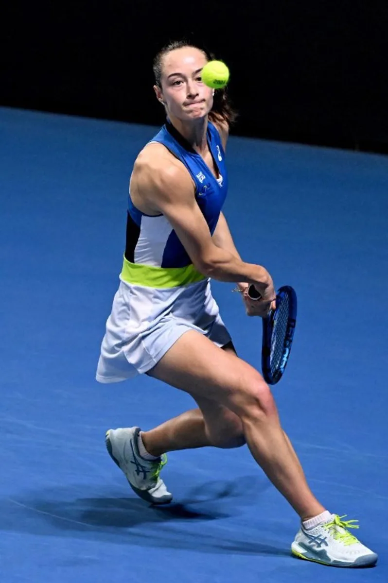 Turkey's Zeynep Sonmez hits a return against France's Clara Burel during their women's singles match at the Brisbane International tennis tournament in Brisbane on January 2, 2024.  William WEST / AFP