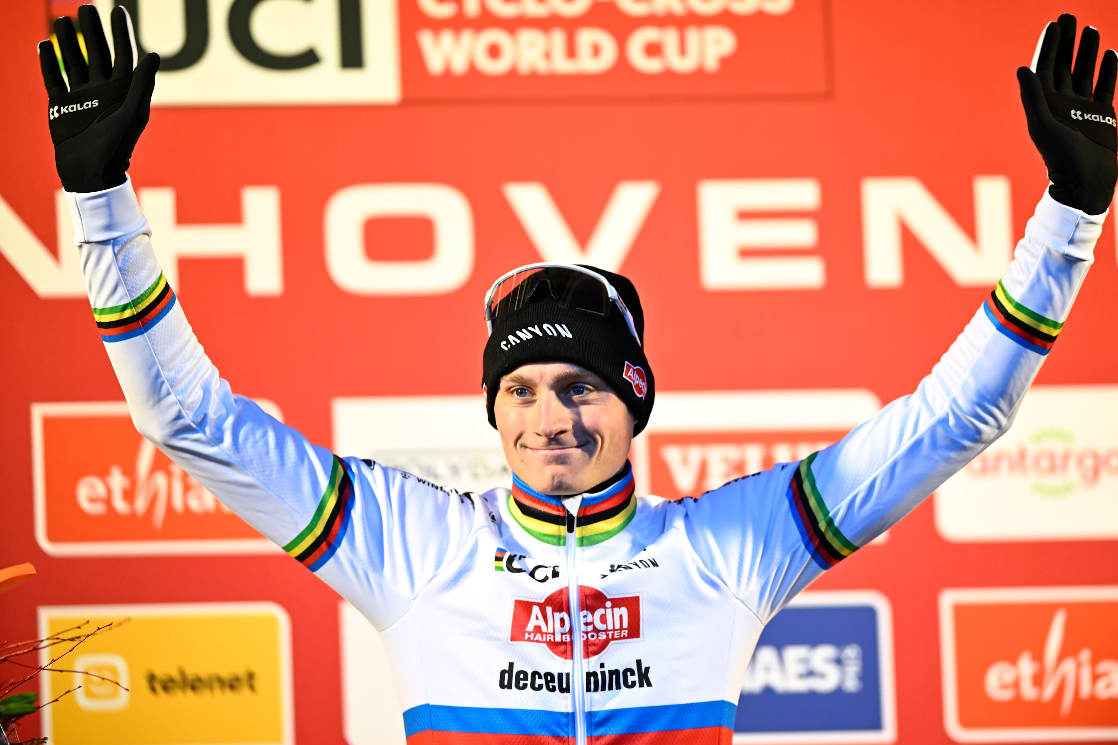 Dutch Mathieu Van Der Poel celebrates on the podium after winning the men's elite race at the World Cup cyclocross cycling event in Zonhoven on Sunday 22 December 2024, stage 6 (out of 12) of the UCI World Cup competition. BELGA PHOTO JASPER JACOBS