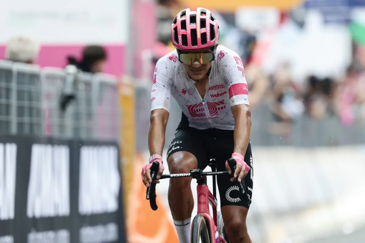 EF Education - EasyPost's Ecuadorian rider Richard Carapaz reacts as he crosses the finish line of the 20th stage of the 108th Giro d'Italia cycling race 205kms from Verres to Sestriere on May 31, 2025. Luca Bettini / AFP
