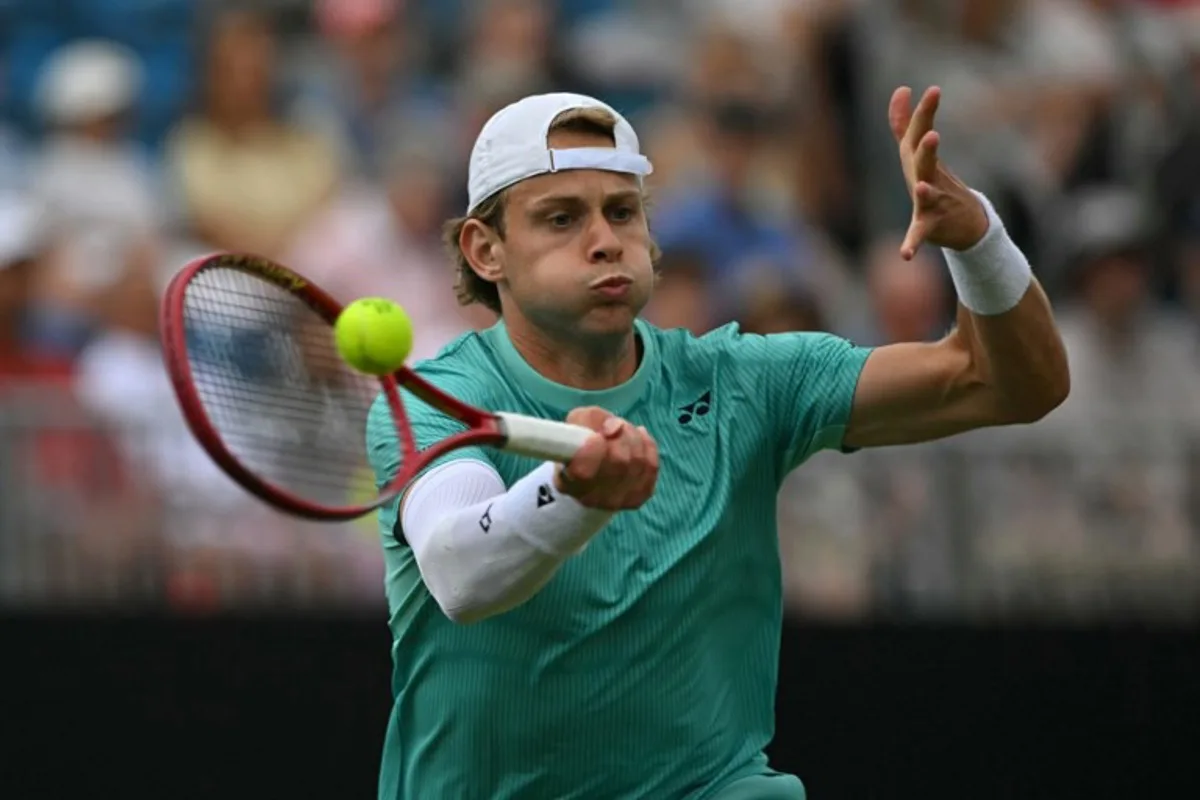 Belgium's Zizou Bergs returns to France's Ugo Humbert during their men's final tennis match on day six of the Lexus Eastbourne Open at Devonshire Park, Eastbourne, on the south coast of England on June 27, 2026.  Glyn KIRK / AFP