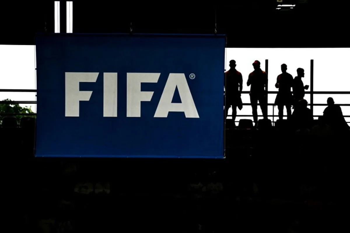 Spectators wait ahead of the UEFA Euro 2024 round of 16 football match between Spain and Georgia at the Cologne Stadium in Cologne on June 30, 2024.  Tobias SCHWARZ / AFP